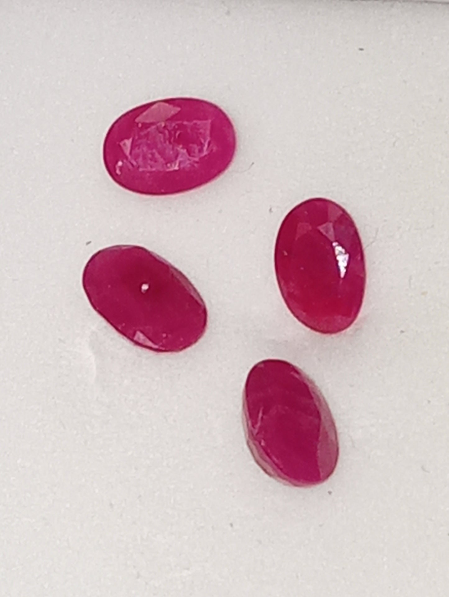ruby gemstones, 6mmx4mm oval cuts, apx .5 cts each, 4 stones