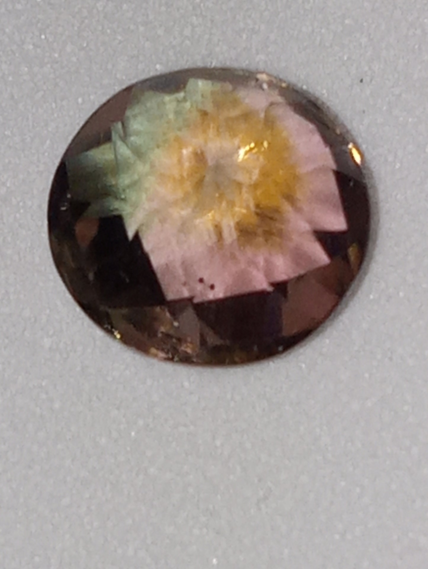 tourmaline gemstone bi-colored , round cut