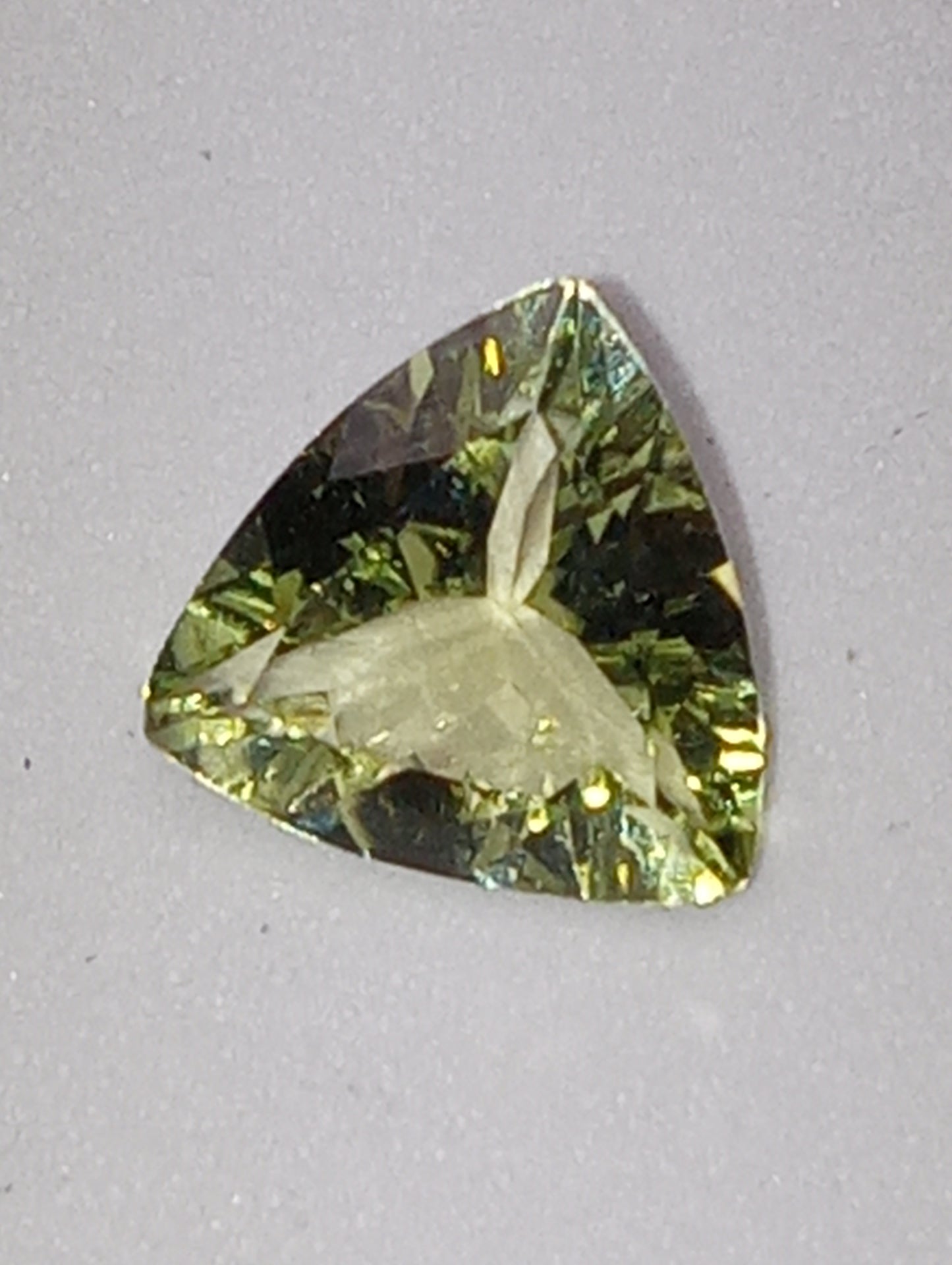tourmaline gemstone light green, trillion cut, 1.75ct