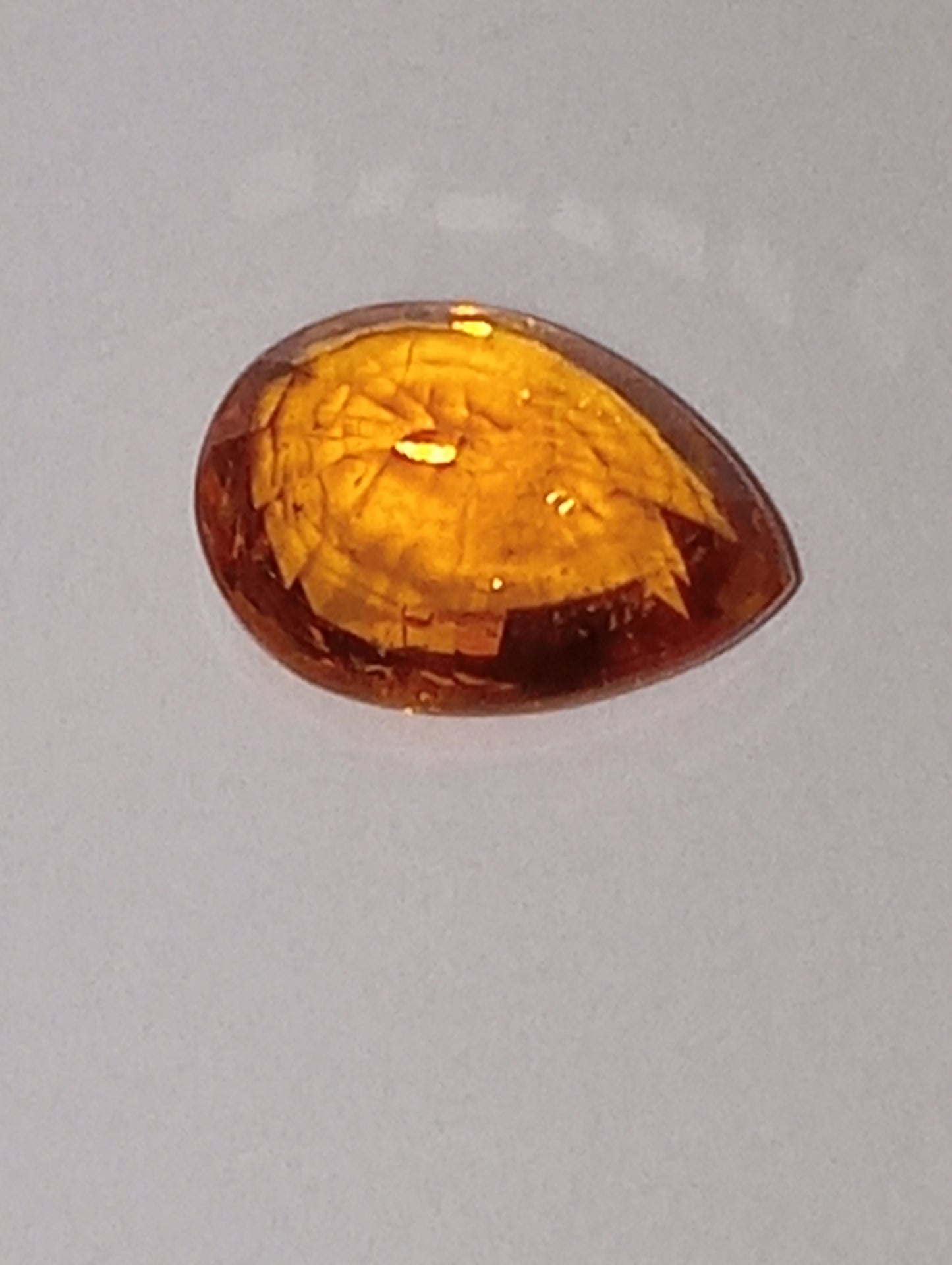 garnet gemstone, mandarin spessartite, pear cut, 1.05ct