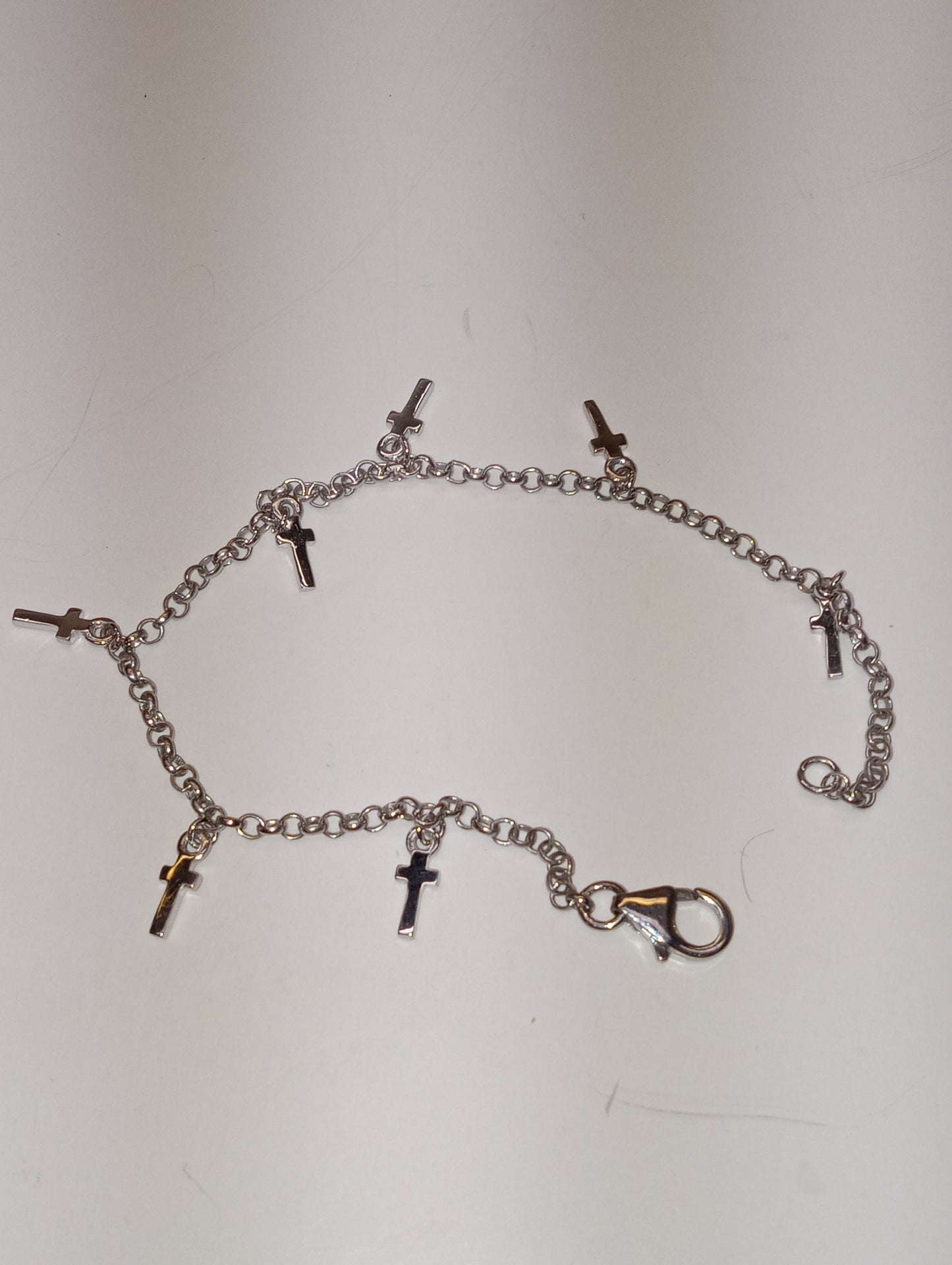 cross charm bracelet