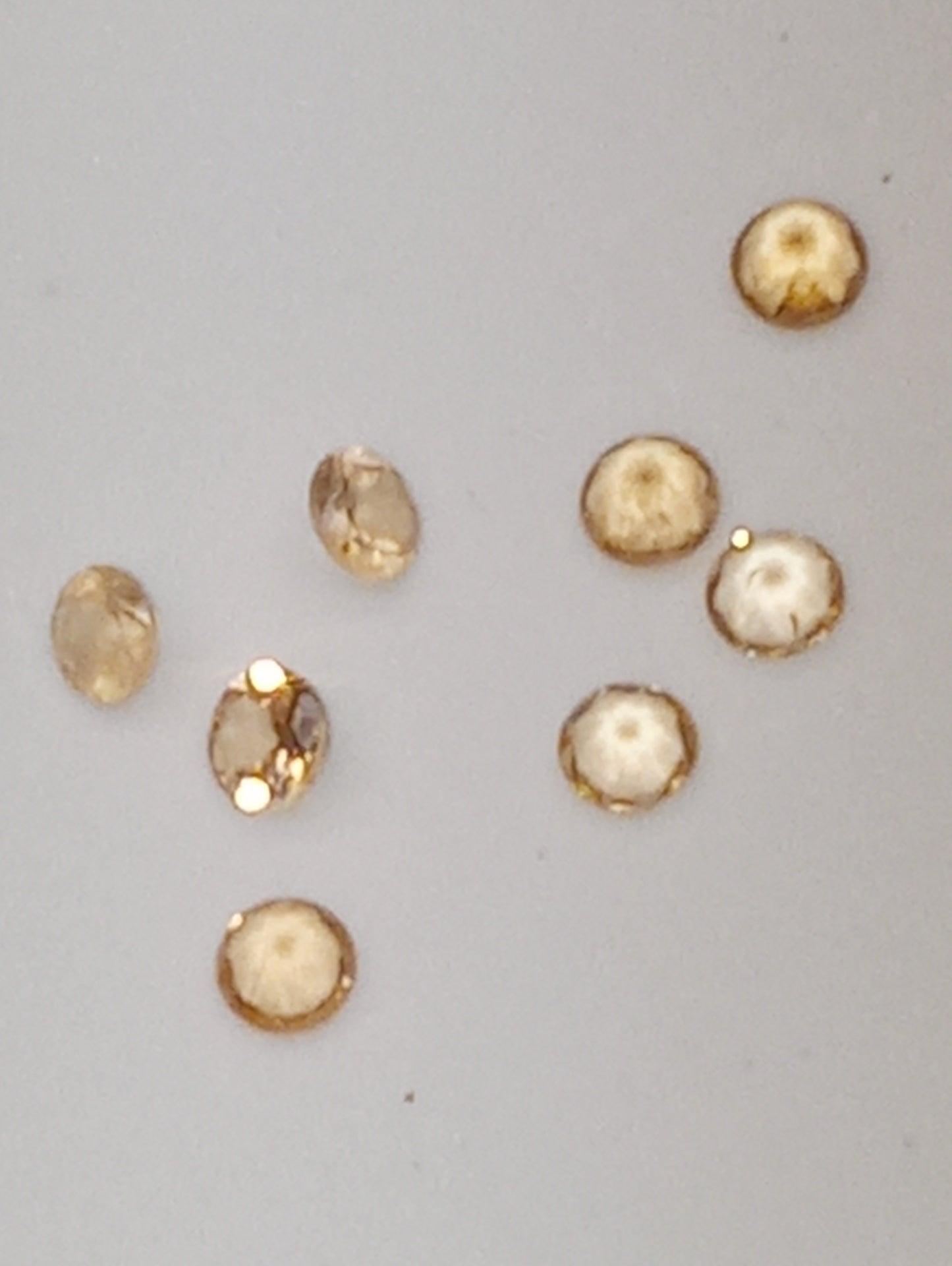 garnet gemstones, Sri Lanka Imperial Hessonite {TM) , 2.5mm-3mm round cut
