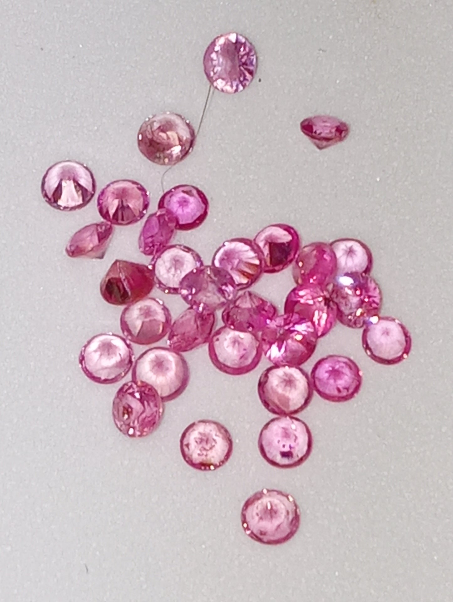 sapphire pink gemstones apx 2mm rounds 30 stones