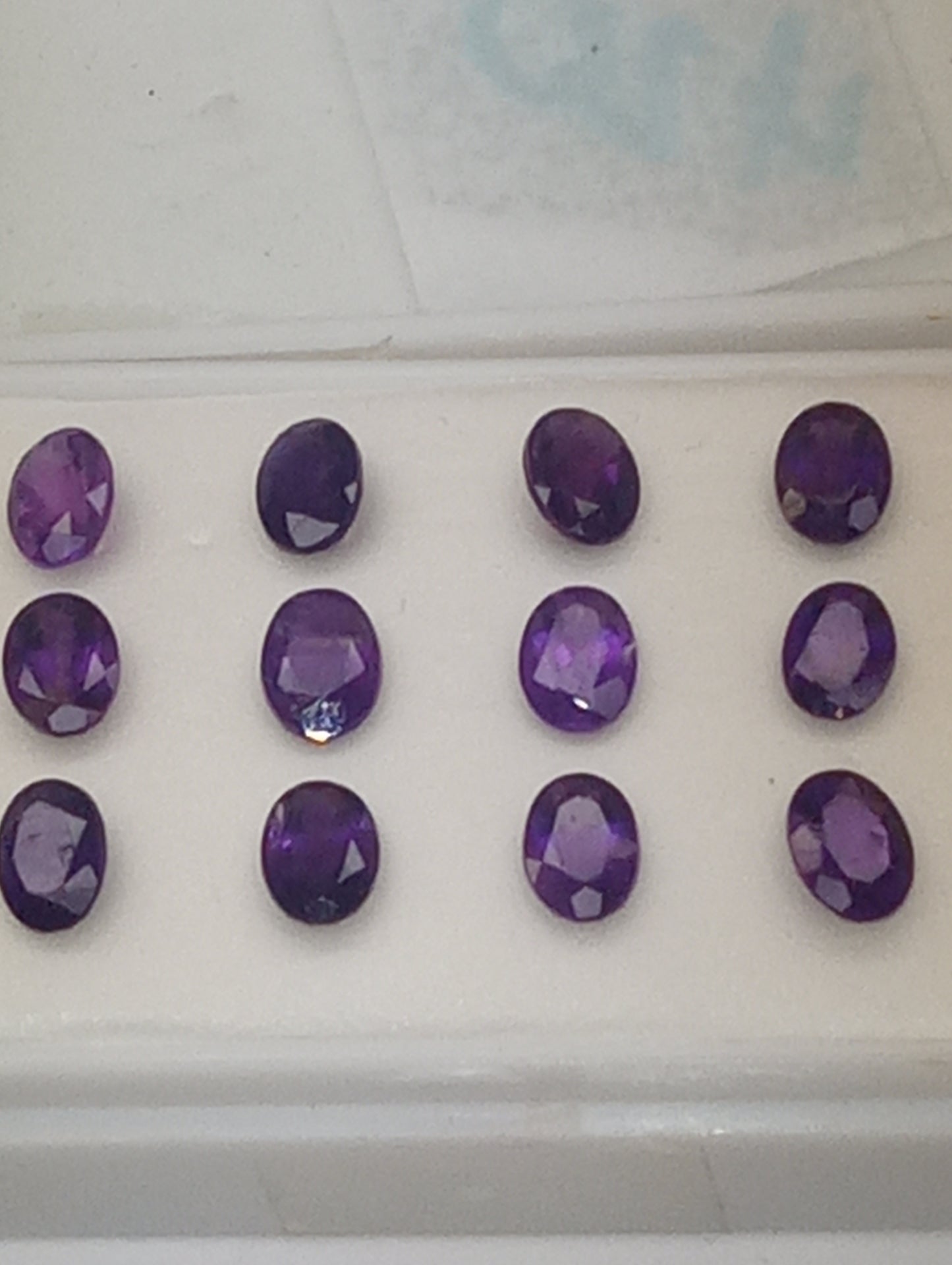 amethyst gemstones dark 7mmx5mm oval cut, 12 stones