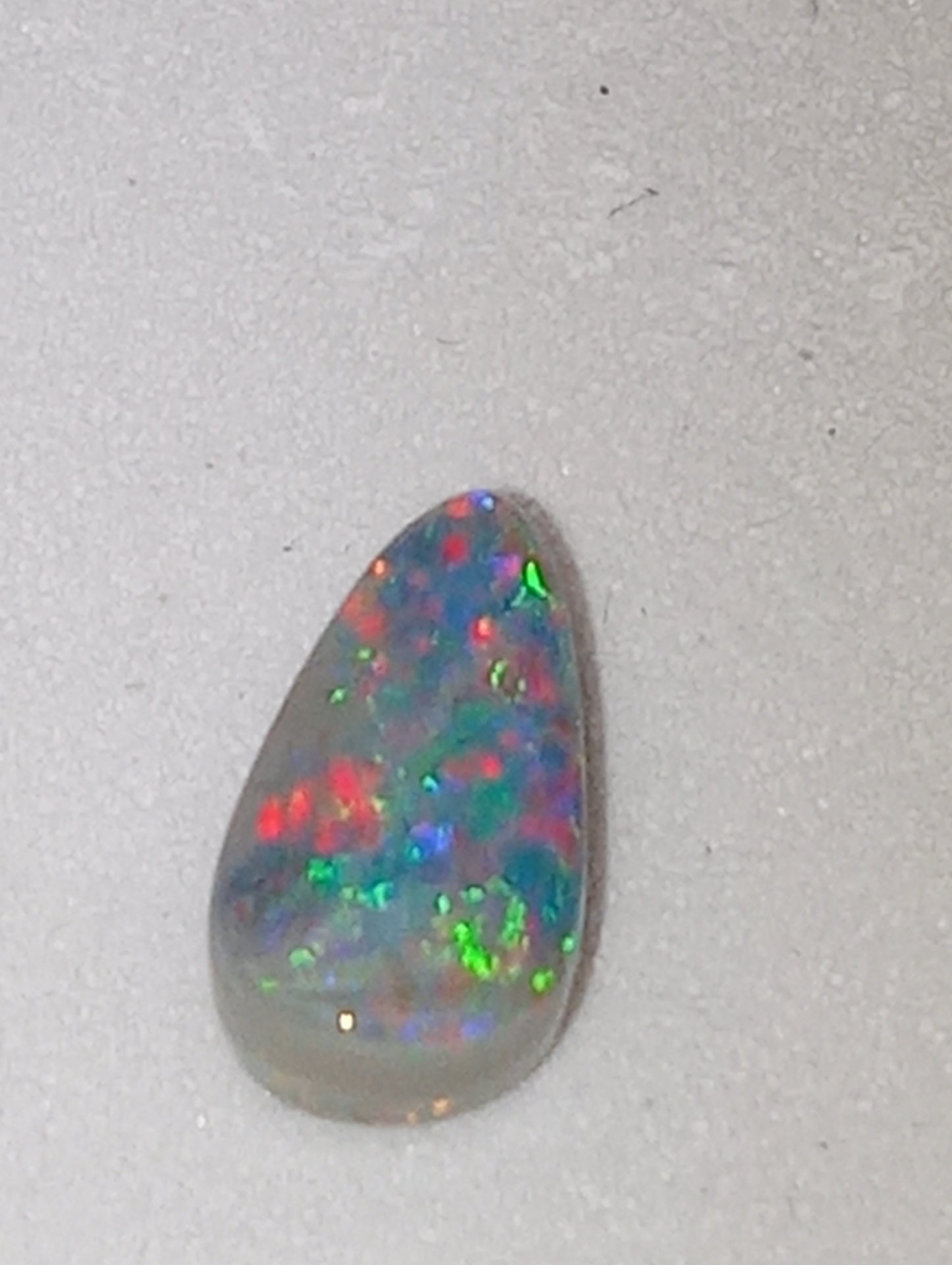opal gemstone Lightning Ridge black .70ct , 8.5mmx5mm