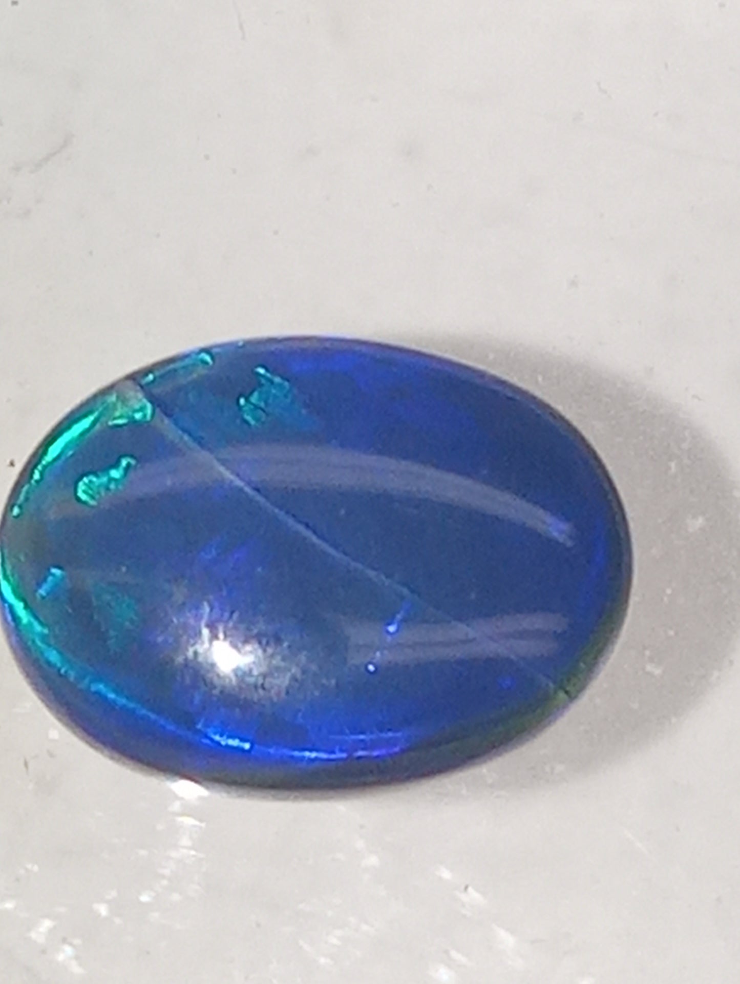 opal gemstone, Lightning Ridge black 10mmx7mm oval, 1.35ct crazed