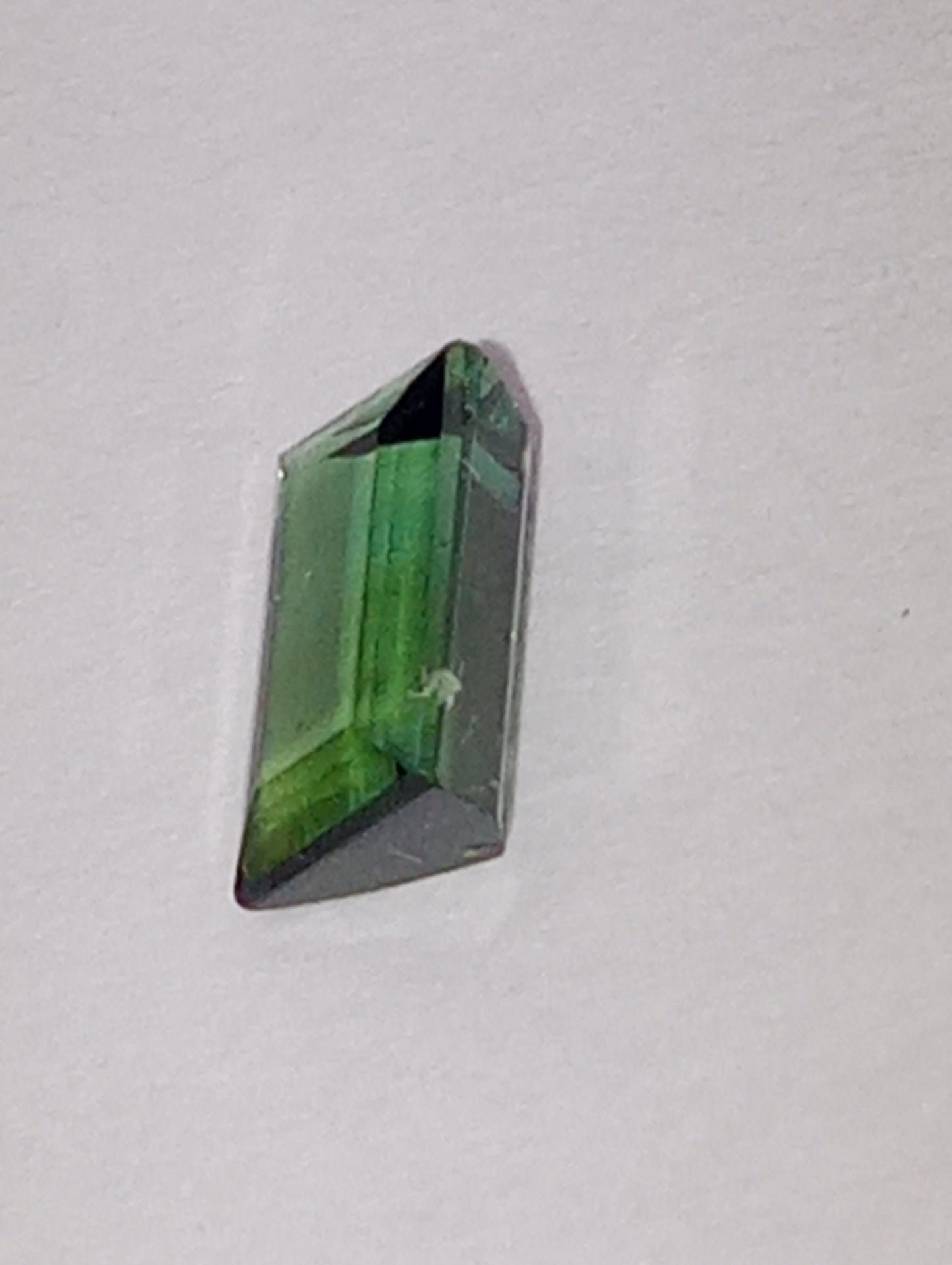 tourmaline gemstone green 6.5mmx4mm emerald cut, .63ct