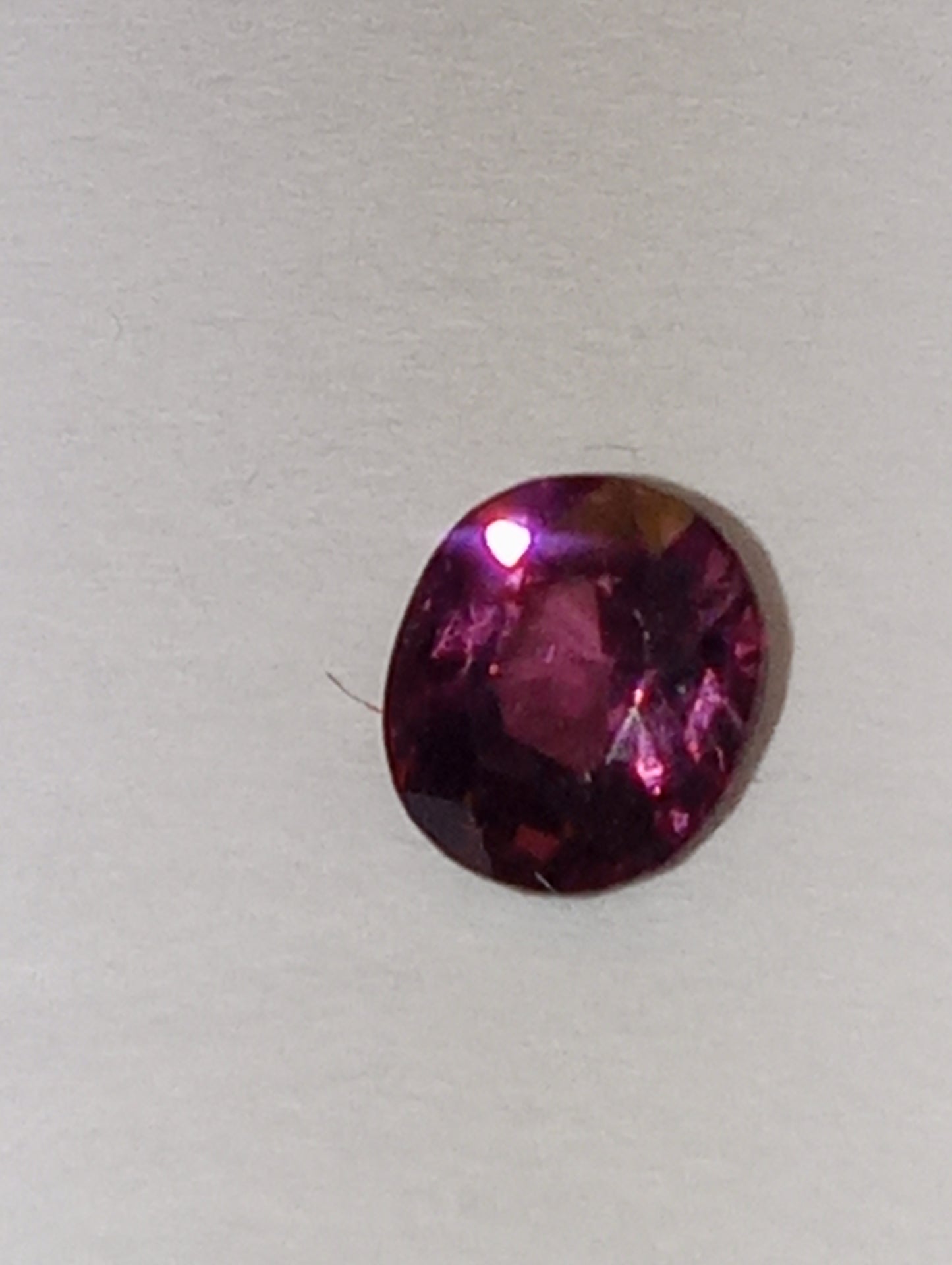 spinel gemstone Burmese, purple , 6mmx5mm oval cut, .74ct