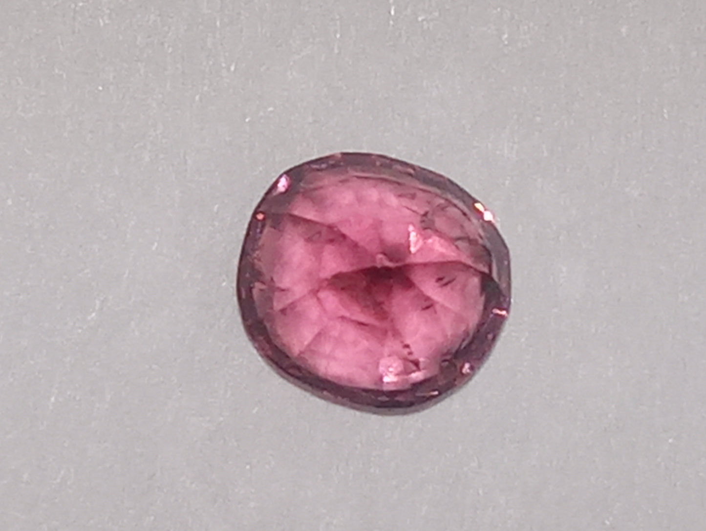 spinel gemstone Burmese, dark pink, 5.25mmx5mm oval cut, .72ct
