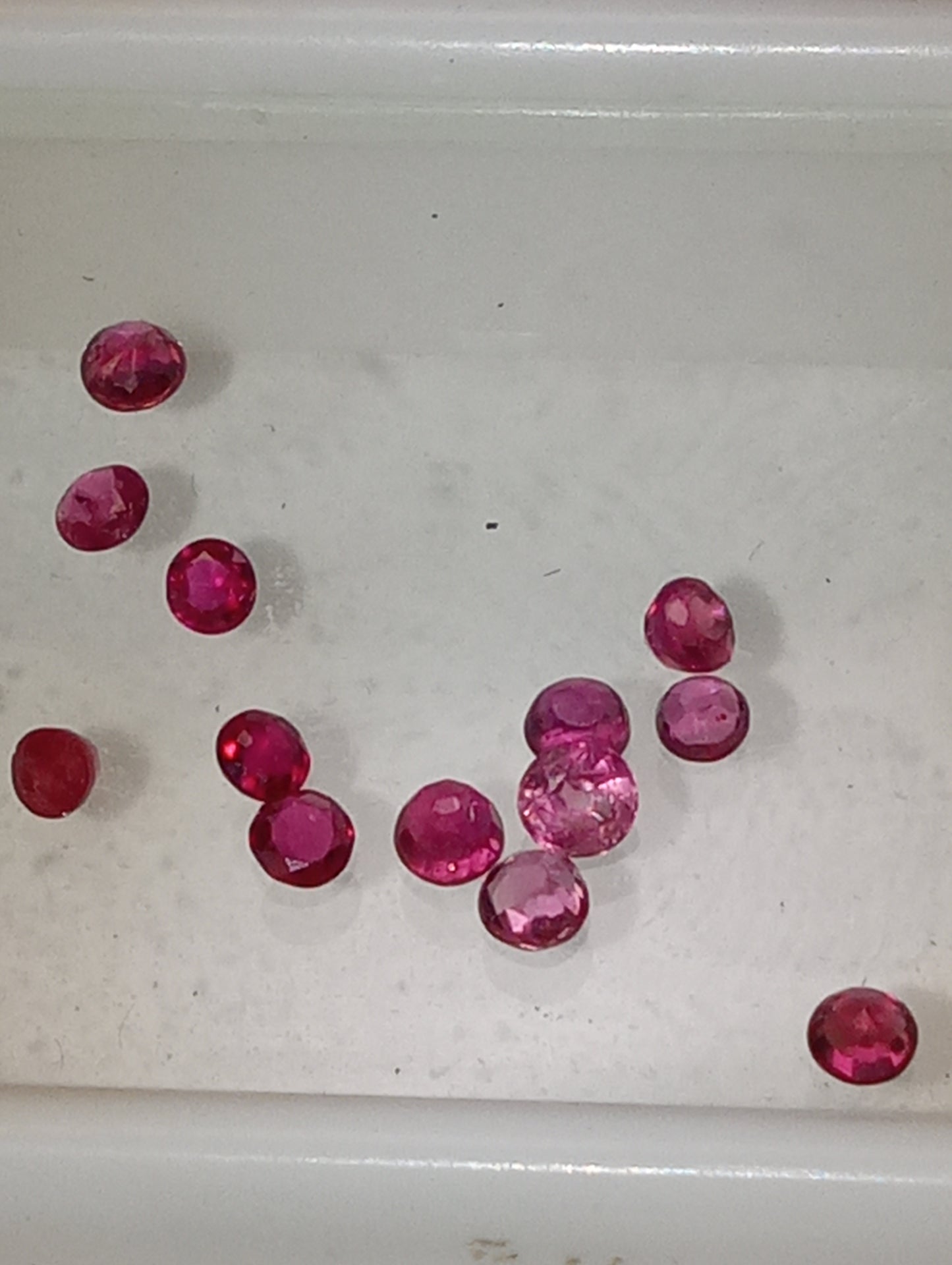 ruby gemstones 2.5mm-3.25mm rounds, 13 stones, 1.44ctw