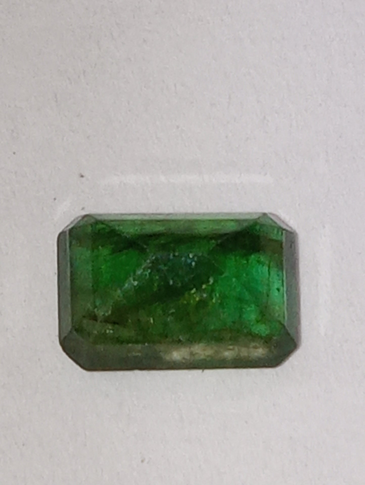 emerald gemstone Zambian, emerald cut 7mmx5mm, .99ct
