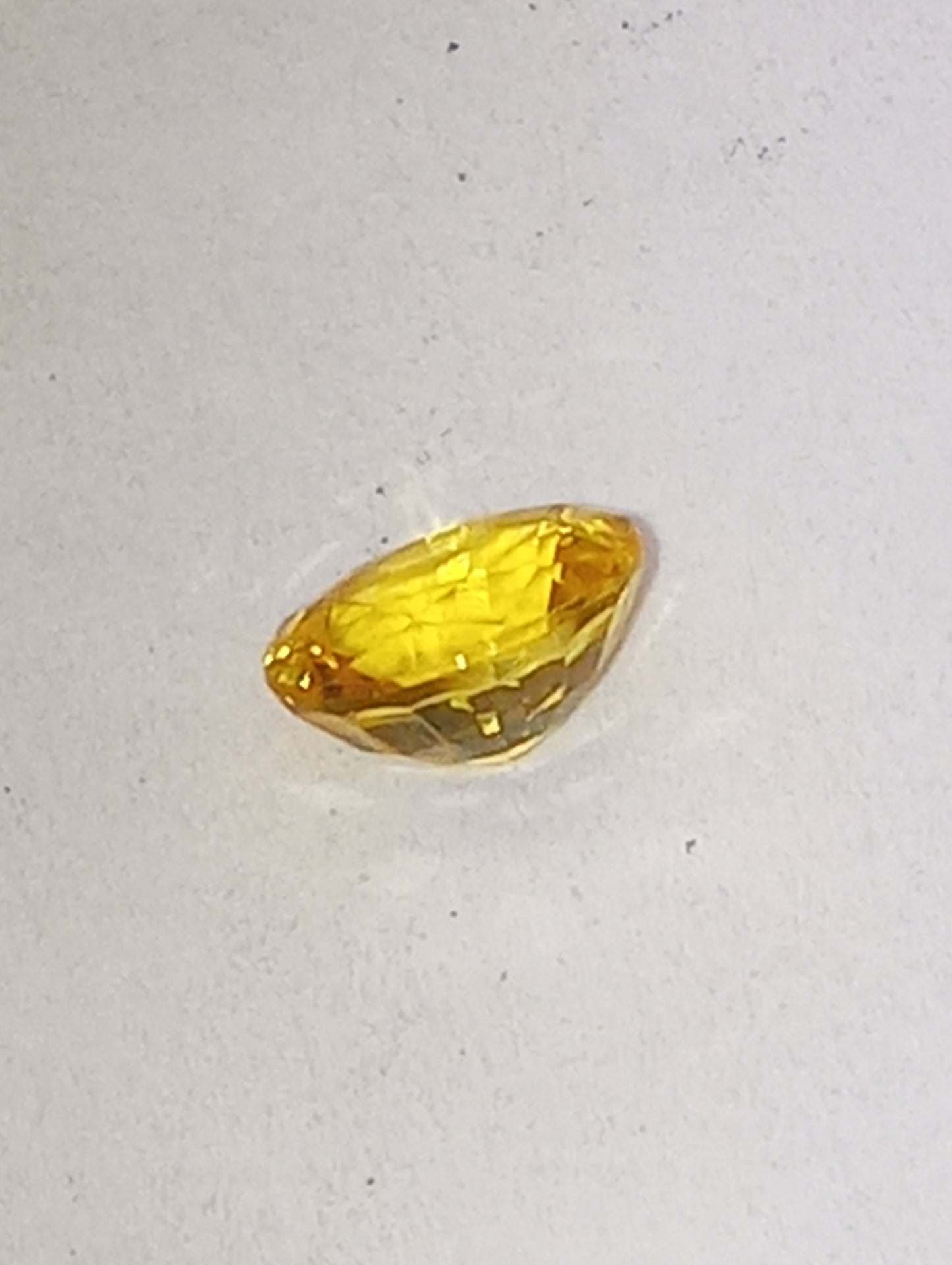 sapphire gemstone yellow vivid, 4.5mmx5.75mm oval cut, .66ct