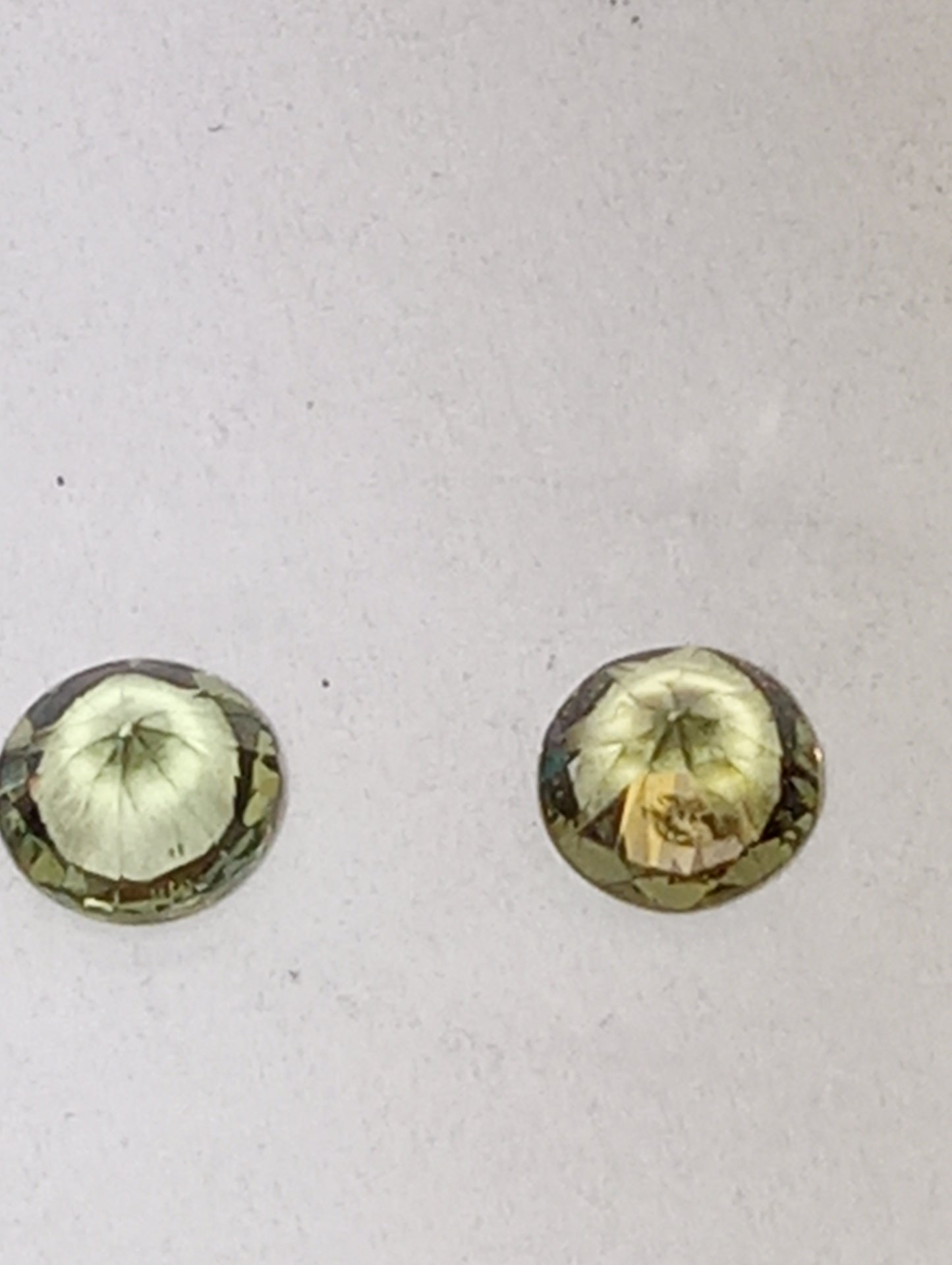 sapphire green 4.5mm round cuts, 2 stones .90ctw