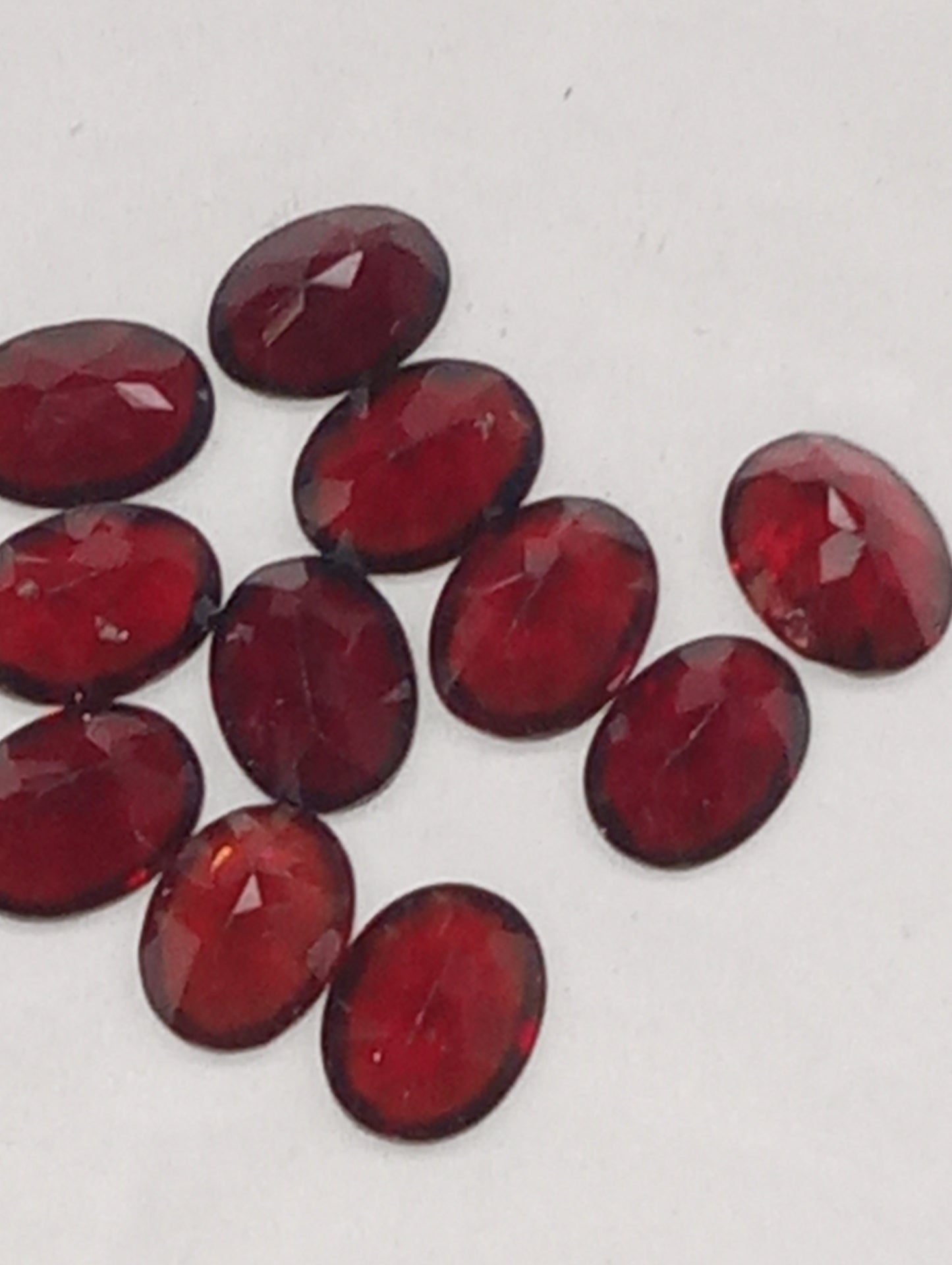 garnet gemstones, red, Orissa, 8mmx6mm oval cut, 11 stones