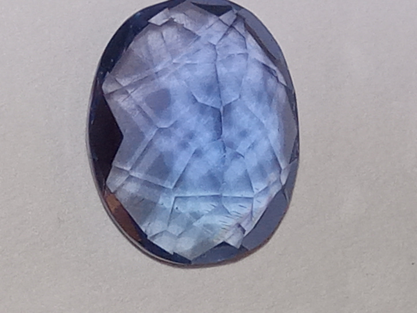 fluorite gemstone, color shift, blue-purple, 11mmx9mm oval cut, 4.08ct