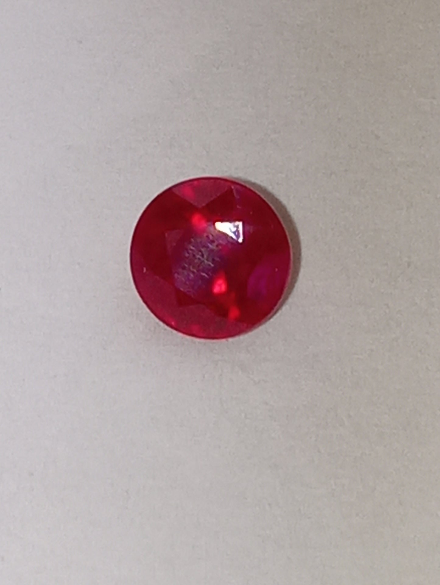 ruby gemstone Burma, 5.25mm round cut, .92ct, deep cut