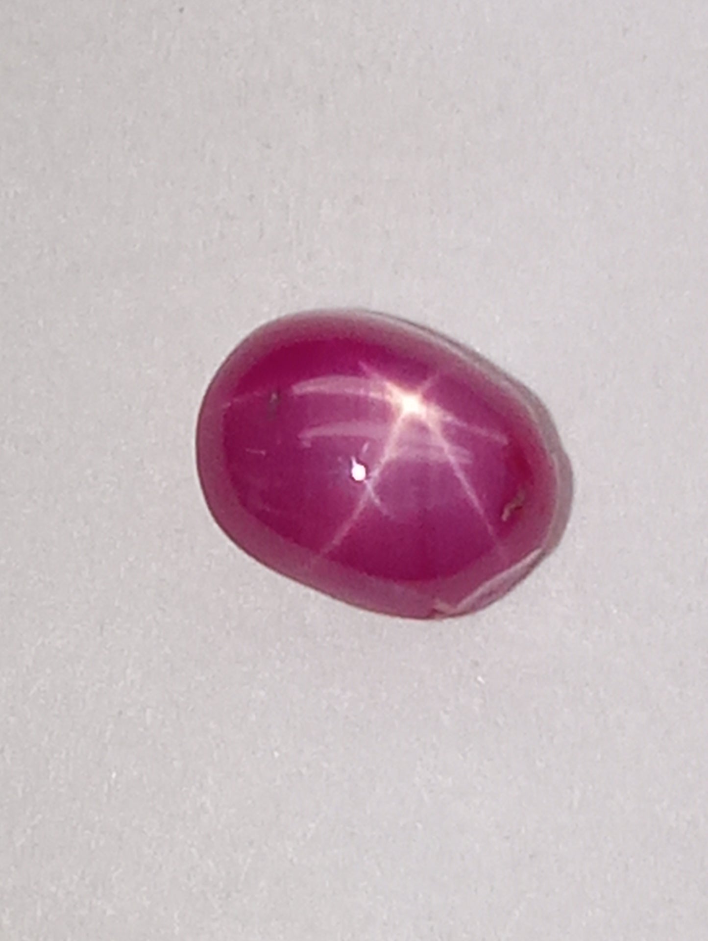 ruby gemstone Burma star, 6mmx4mm oval cabacon, 1.07ct