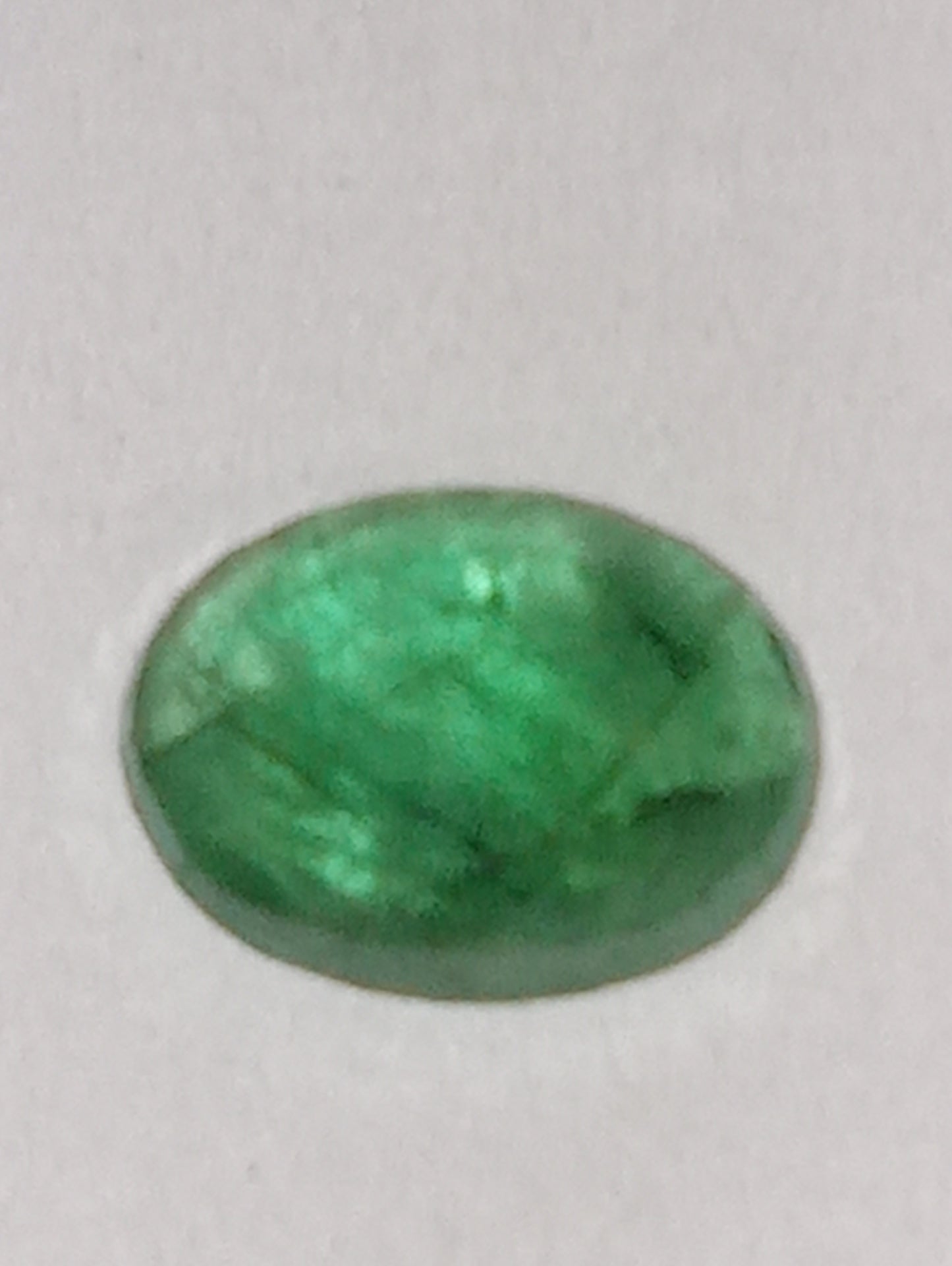emerald gemstone, 7mmx5mm oval cut, .65ct