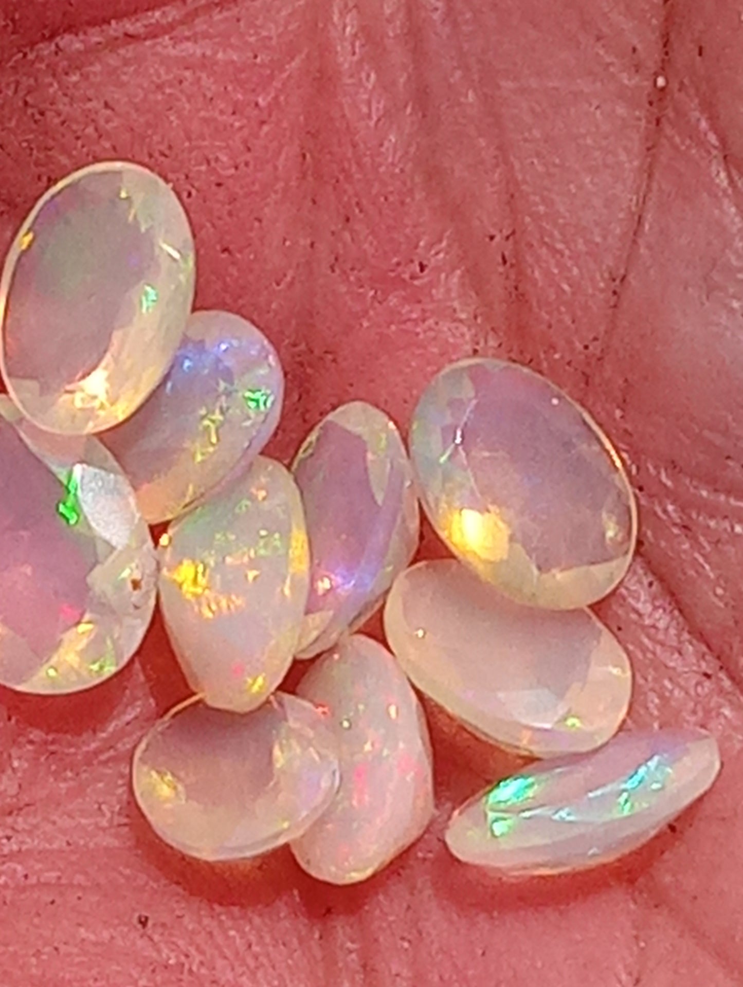 opal gemstones Ethiopian, faceted 7mmx5mm oval cuts, 10 stones