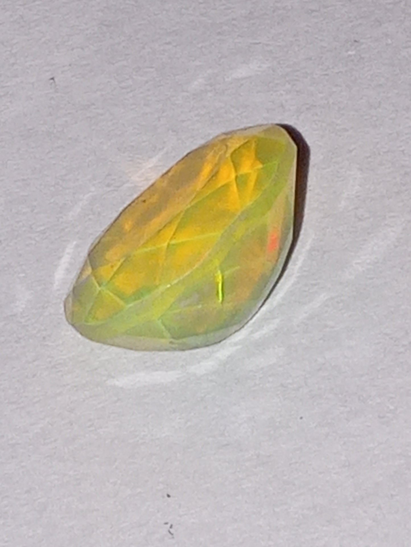 opal gemstone Ethiopian, faceted, 11mmx9mm oval cut, 2.27ct