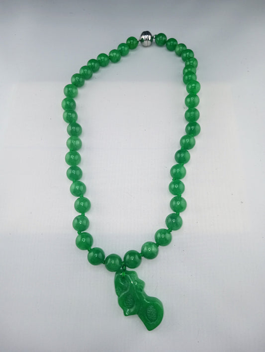 green jade necklace with carved green jade orchid