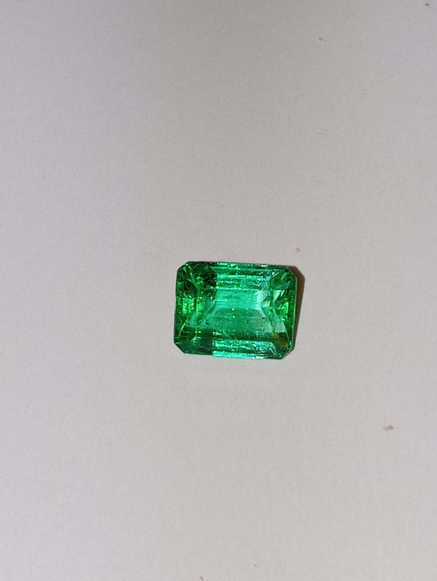 emerald gemstone Columbian 6.5mmx5mm emerald cut, .83ct