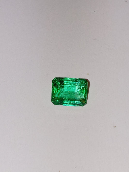 emerald gemstone Columbian 6.5mmx5mm emerald cut, .83ct