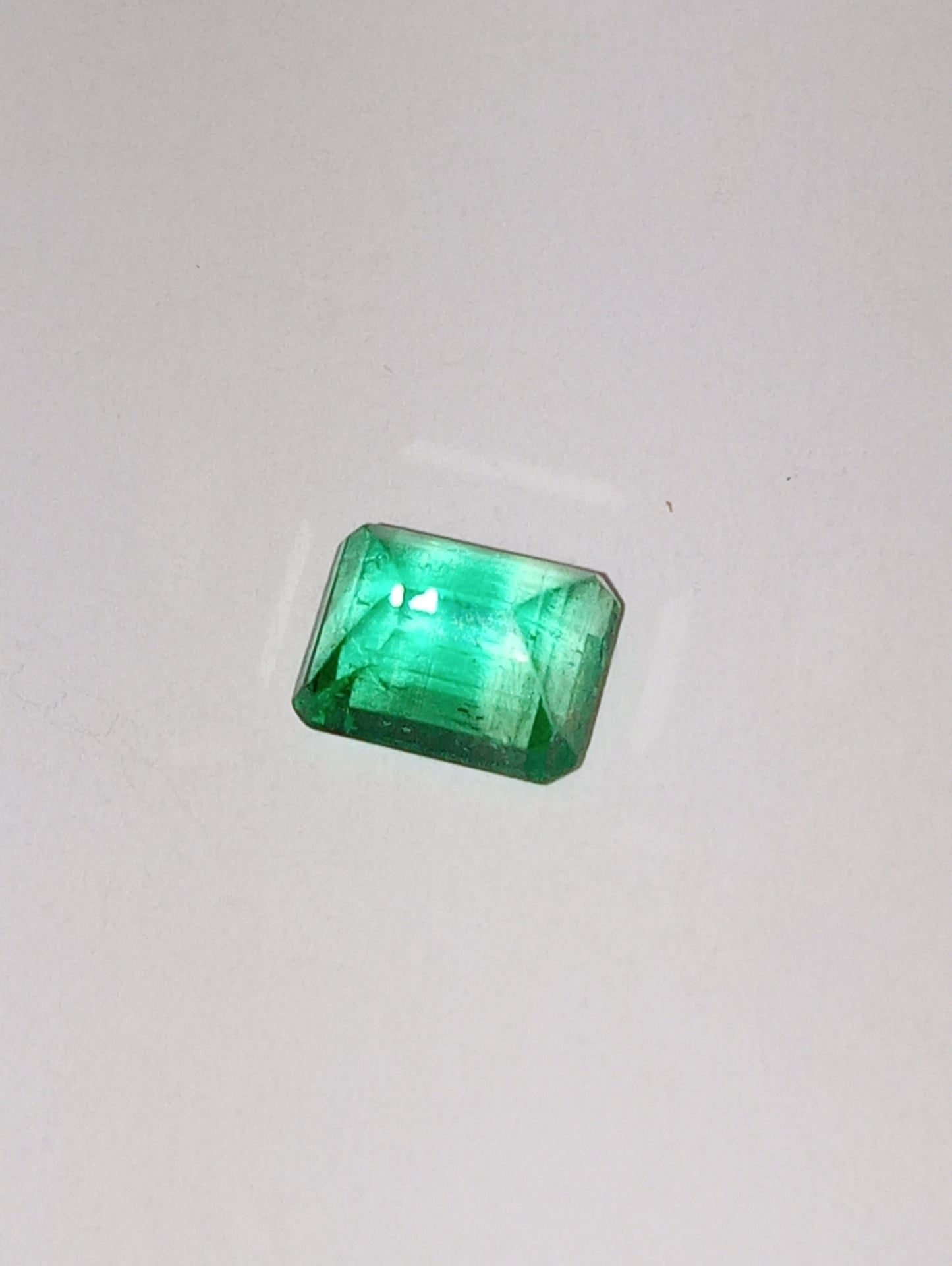 emerald gemstone Columbian 6.5mmx5mm emerald cut, .83ct