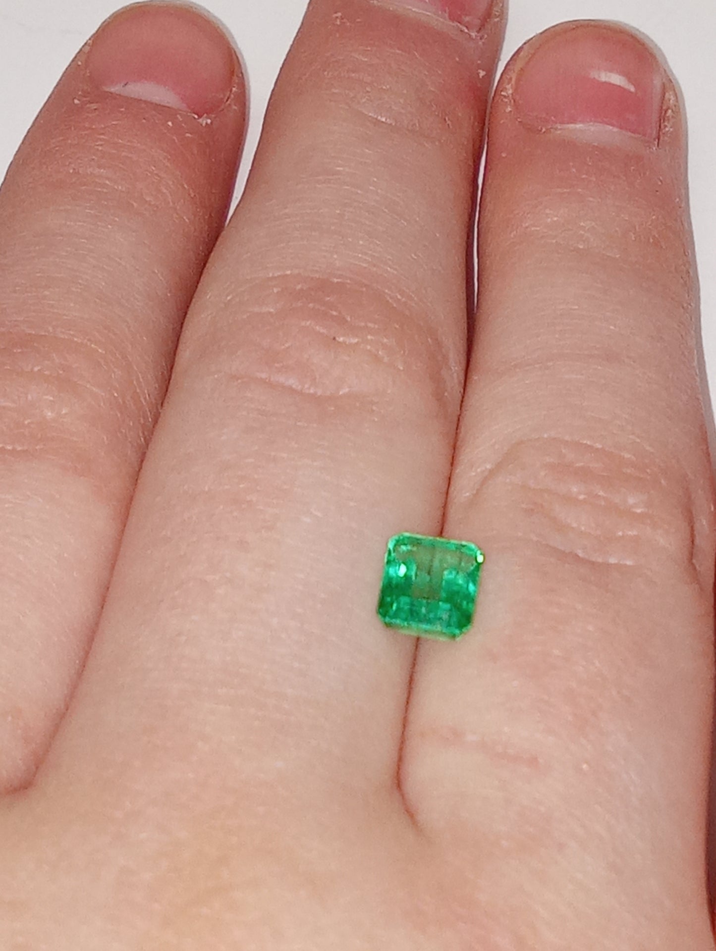 emerald gemstone Columbian 6.5mmx5mm emerald cut, .83ct