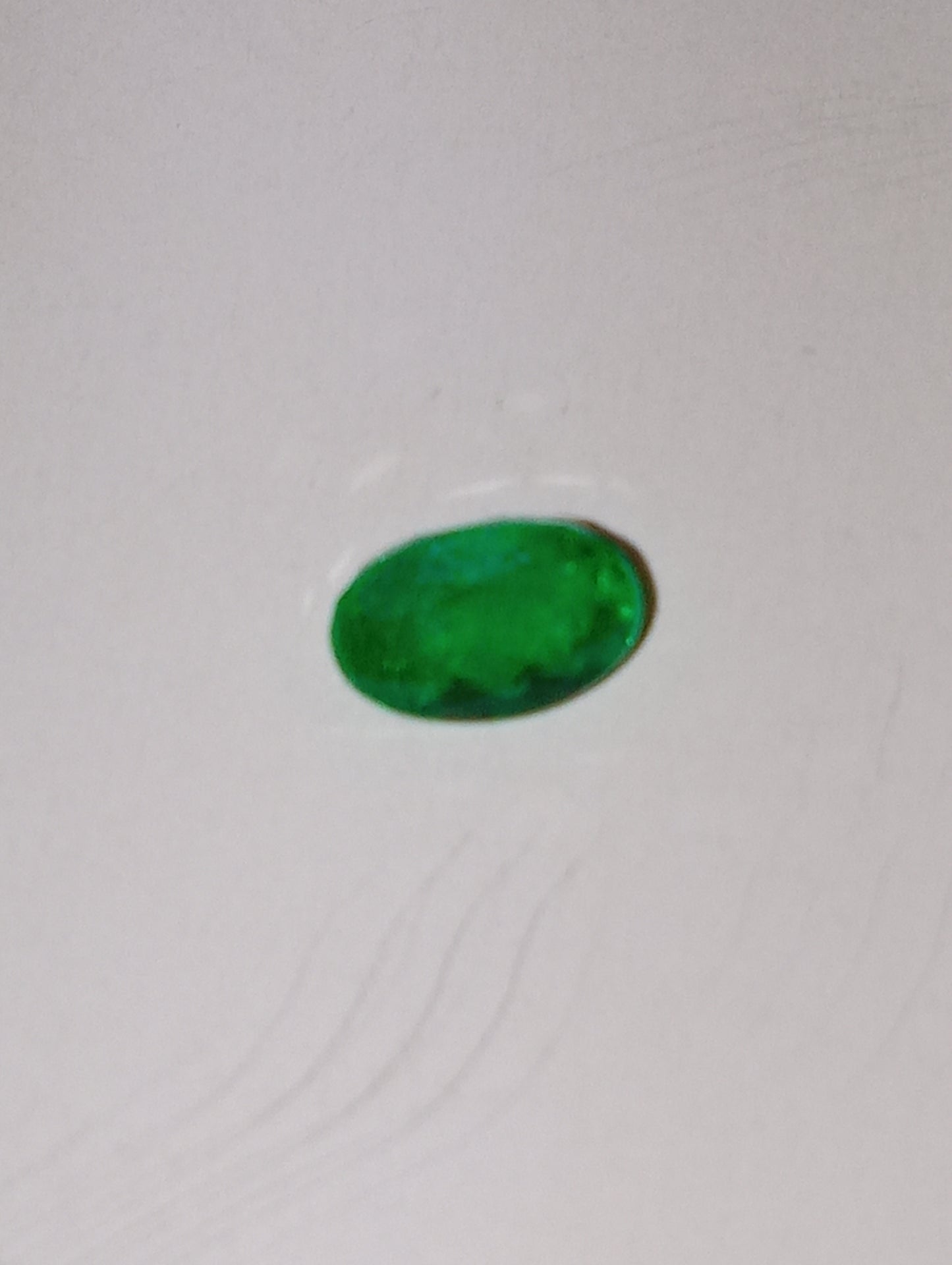 emerald gemstone Colombian, oval cut 6mmx4mm, .51ct
