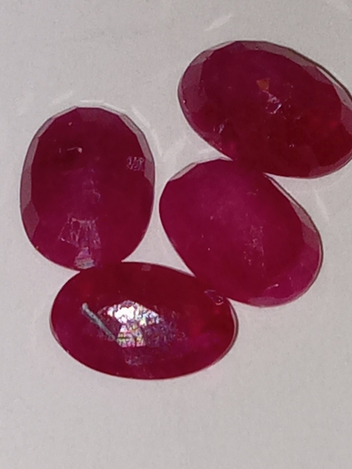 ruby gemstones, 6mmx4mm oval cuts, apx .5 cts each, 4 stones