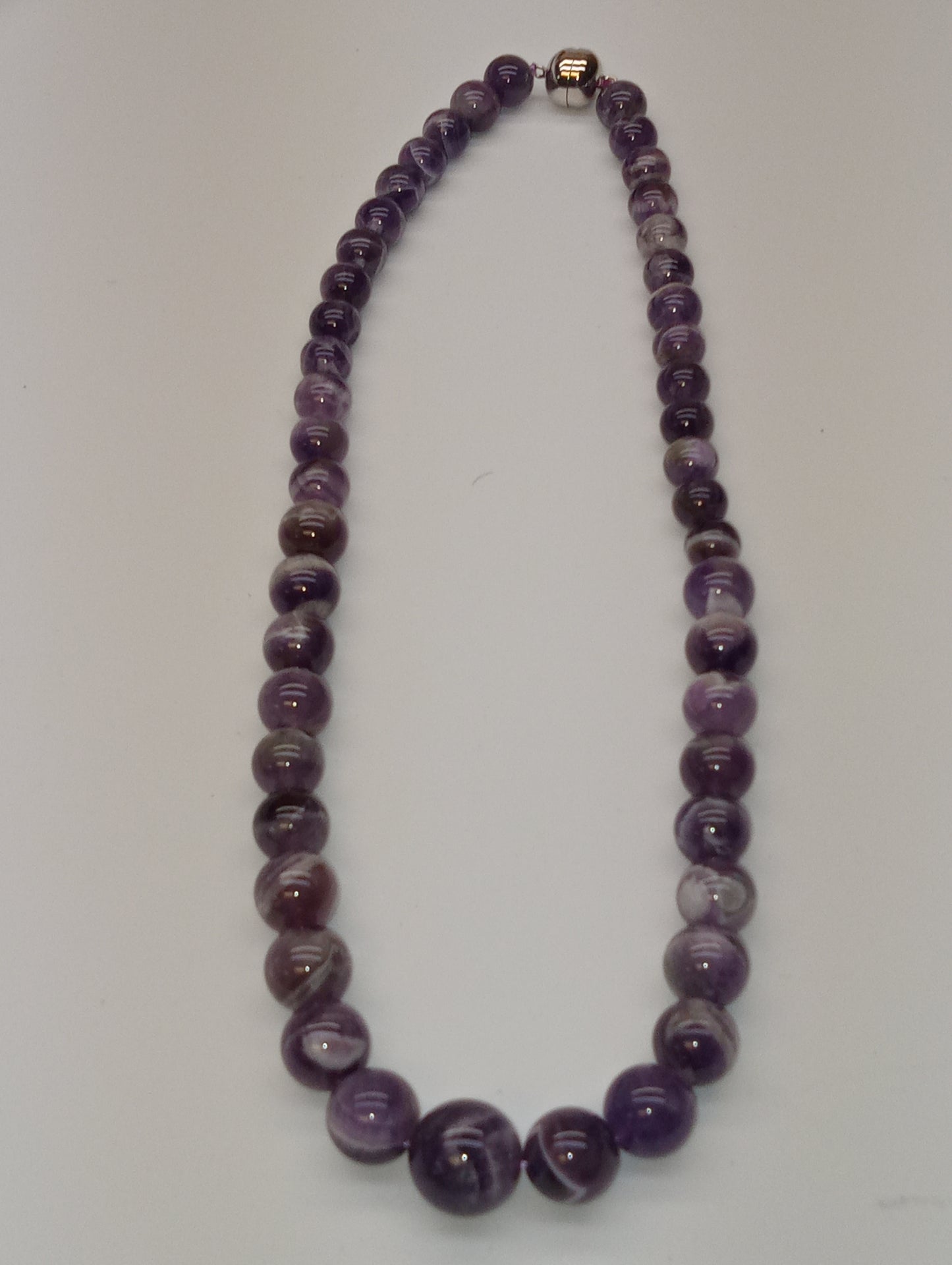 necklace, bi-color amethyst 10-17mm beads, beaded, 20inches magnetic sterling clasp