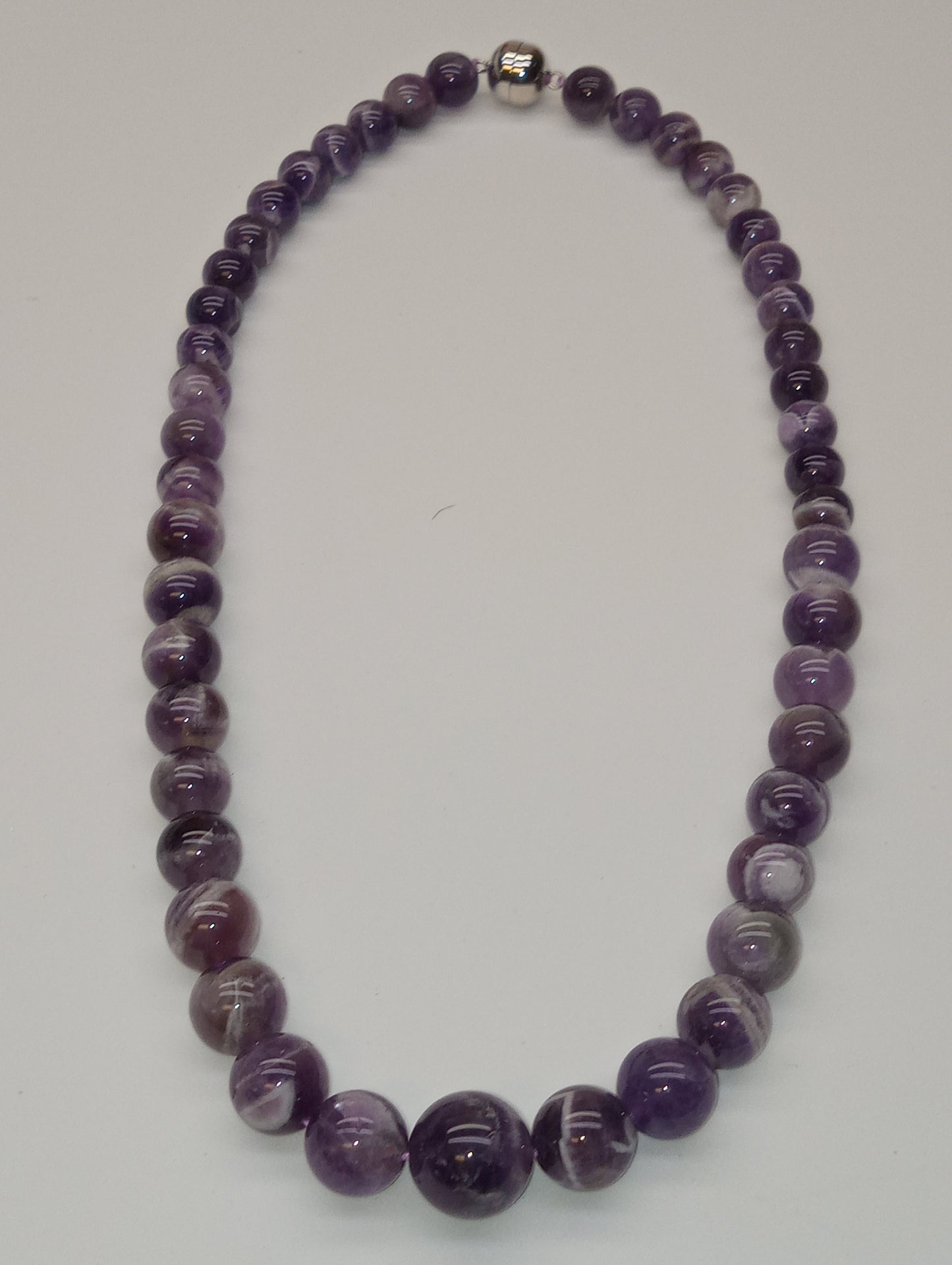 necklace, bi-color amethyst 10-17mm beads, beaded, 20inches magnetic sterling clasp