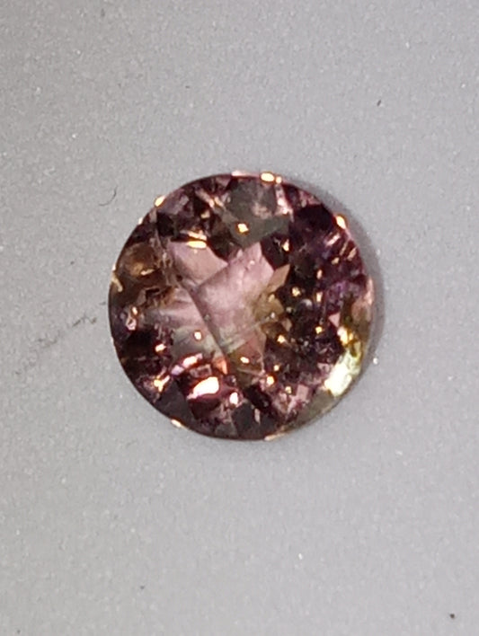 tourmaline gemstone bi-colored , round cut