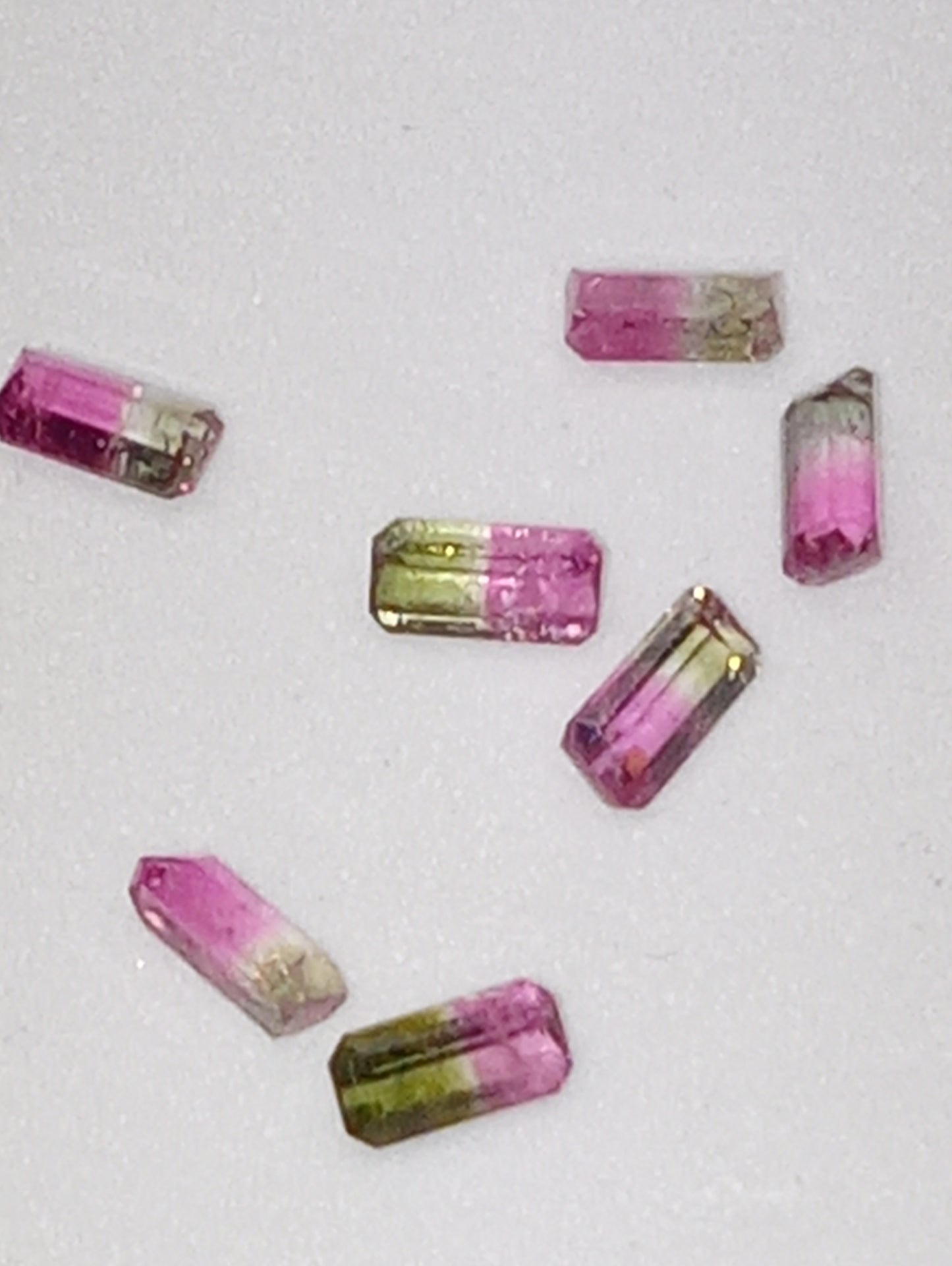 tourmaline gemstones bi-colored   2mmx4mm- 3mmx5mm  emerald cut