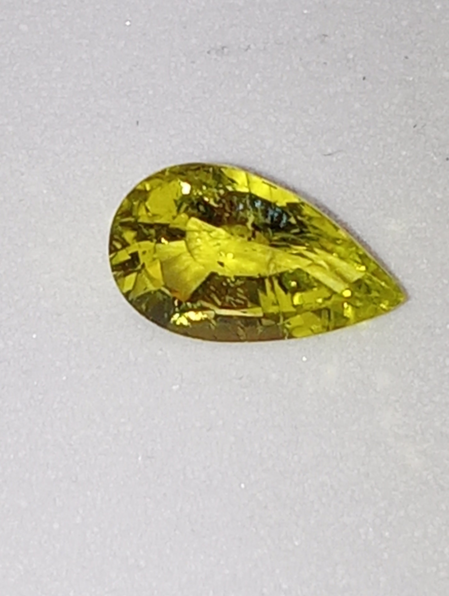 tourmaline gemstone cuprian neon yellow pear shape .92ct