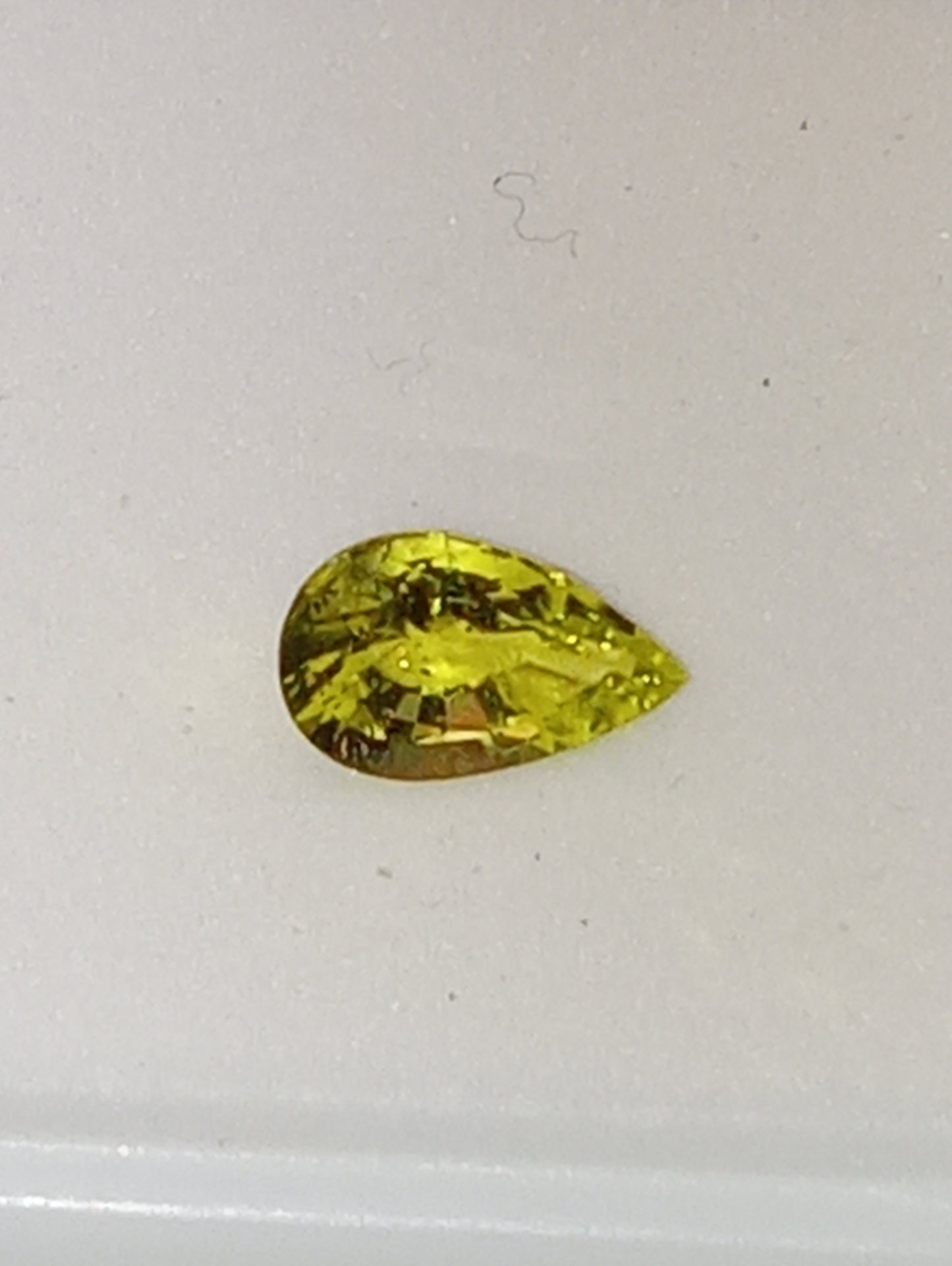 tourmaline gemstone cuprian neon yellow pear shape .92ct