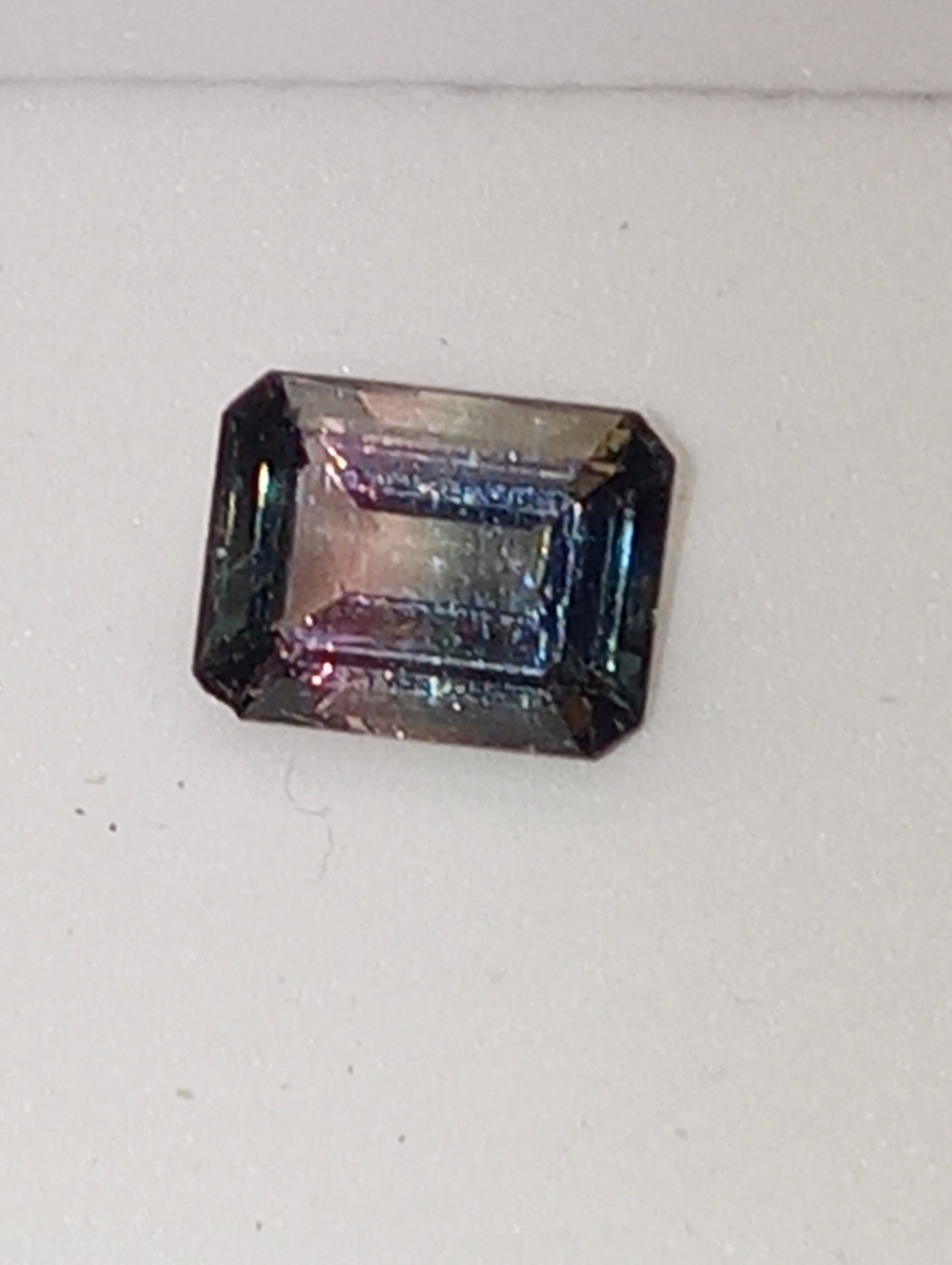 tourmaline gemstone bi-colored emerald cut 9mmx7mm