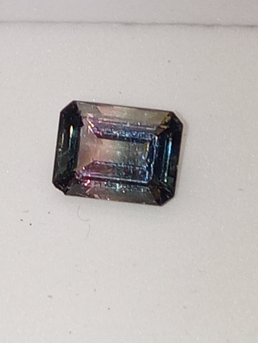 tourmaline gemstone bi-colored emerald cut 9mmx7mm