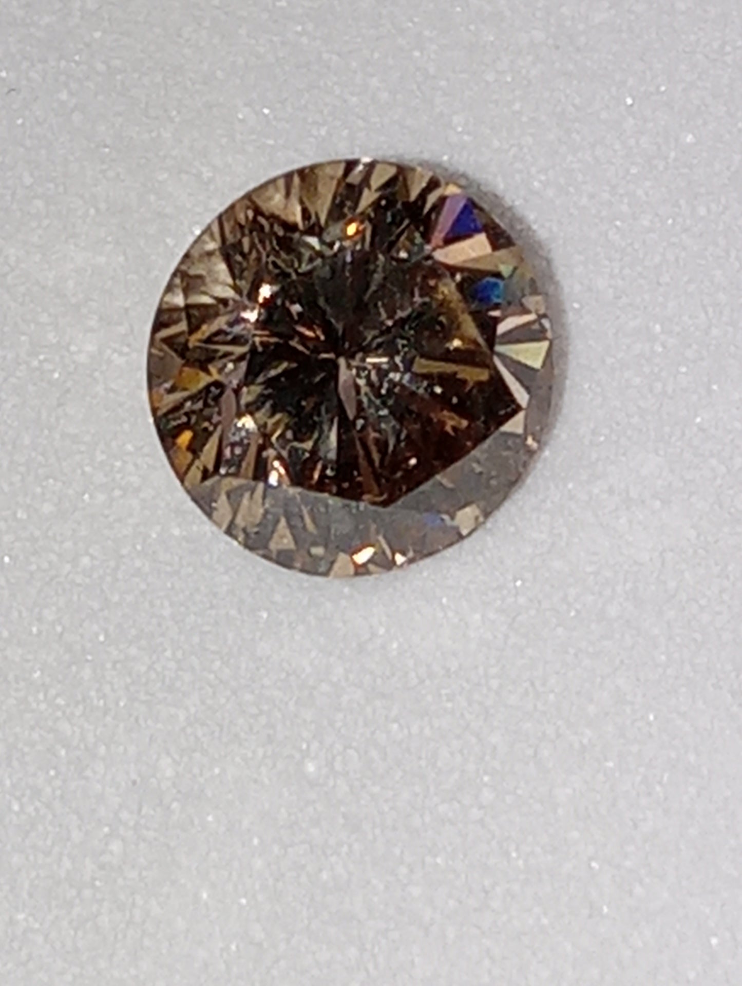 diamond gemstone champagne, round cut .68ct