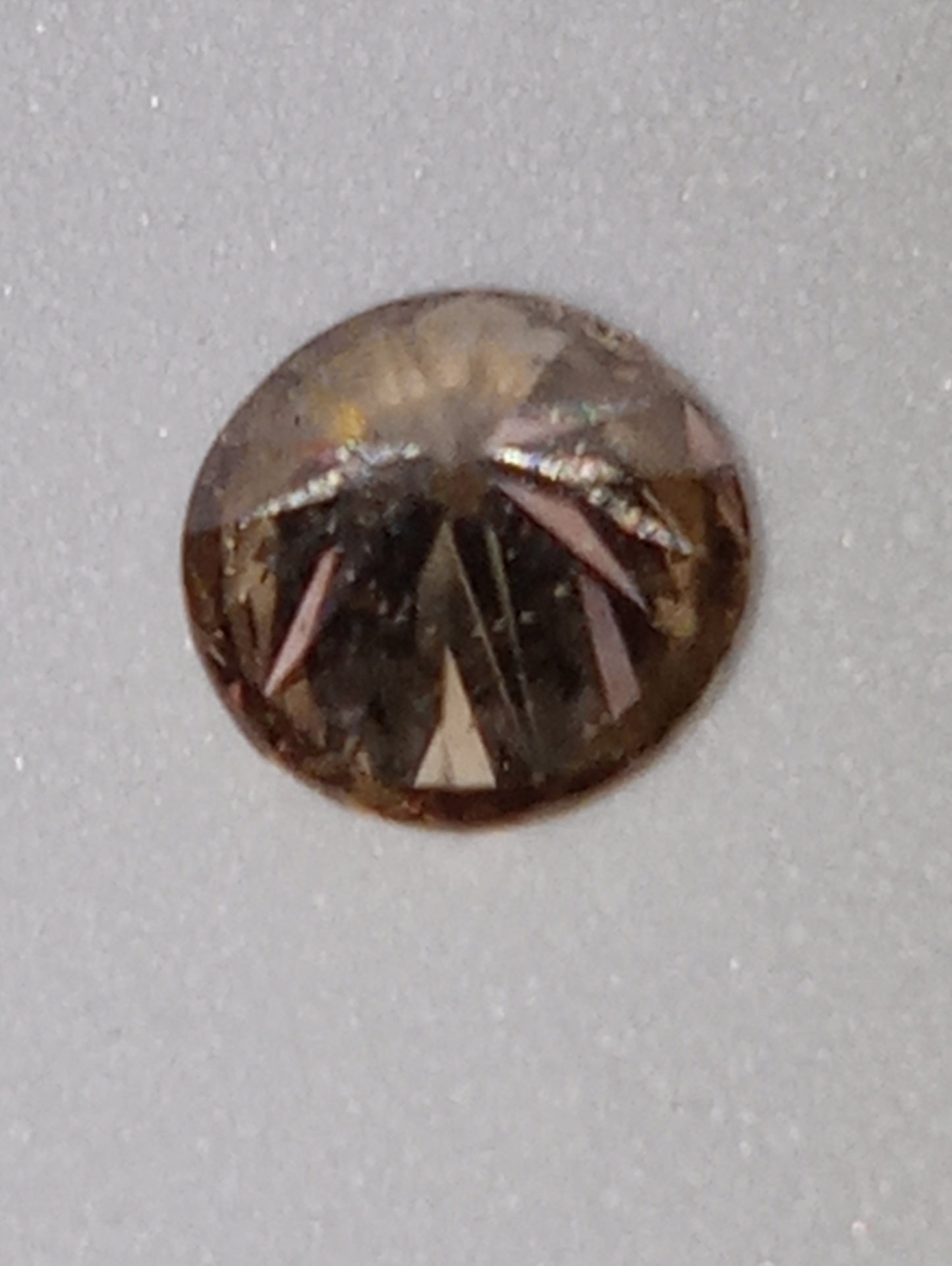 diamond gemstone champagne, round cut .68ct