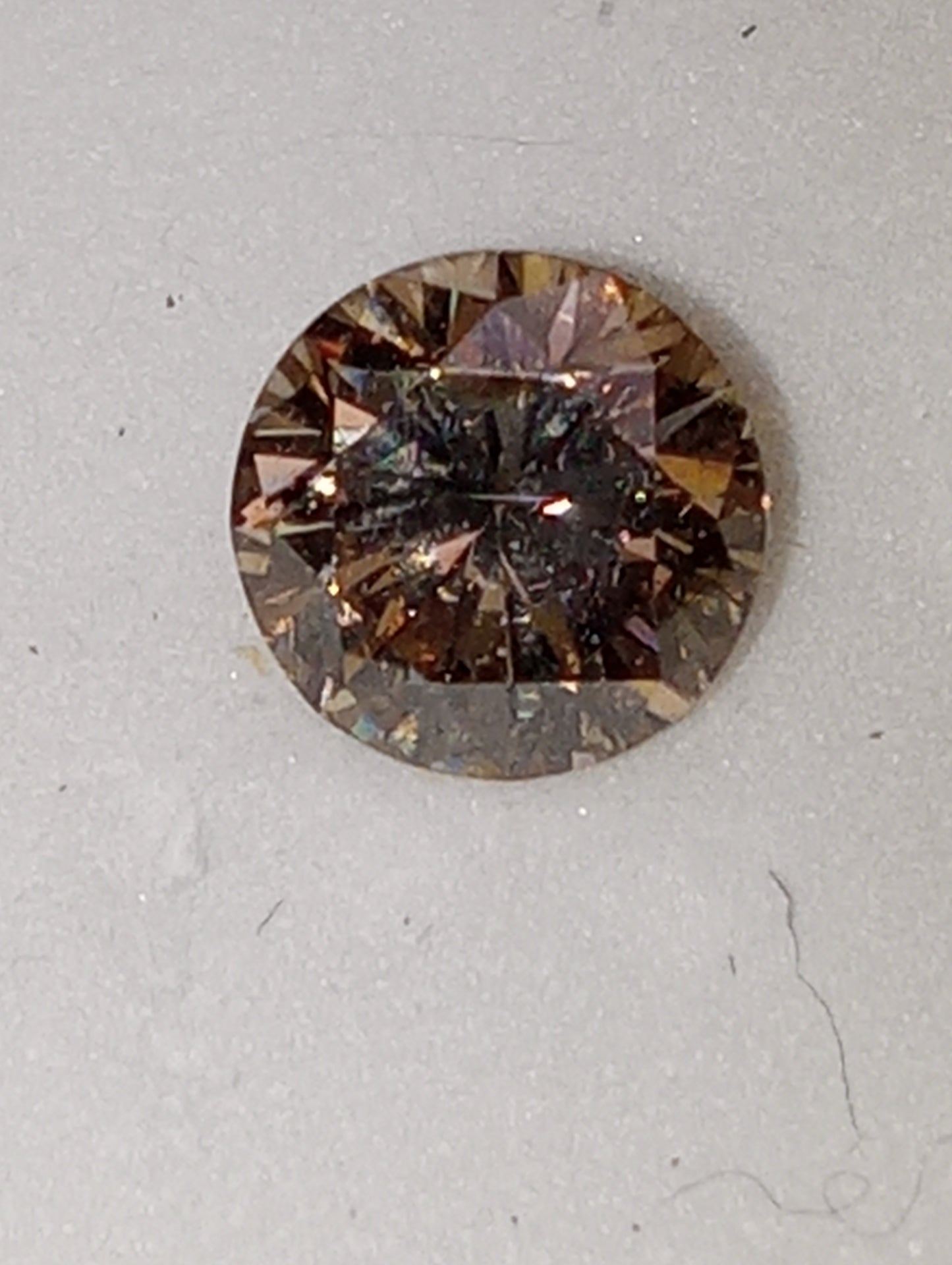 diamond gemstone champagne, round cut .68ct