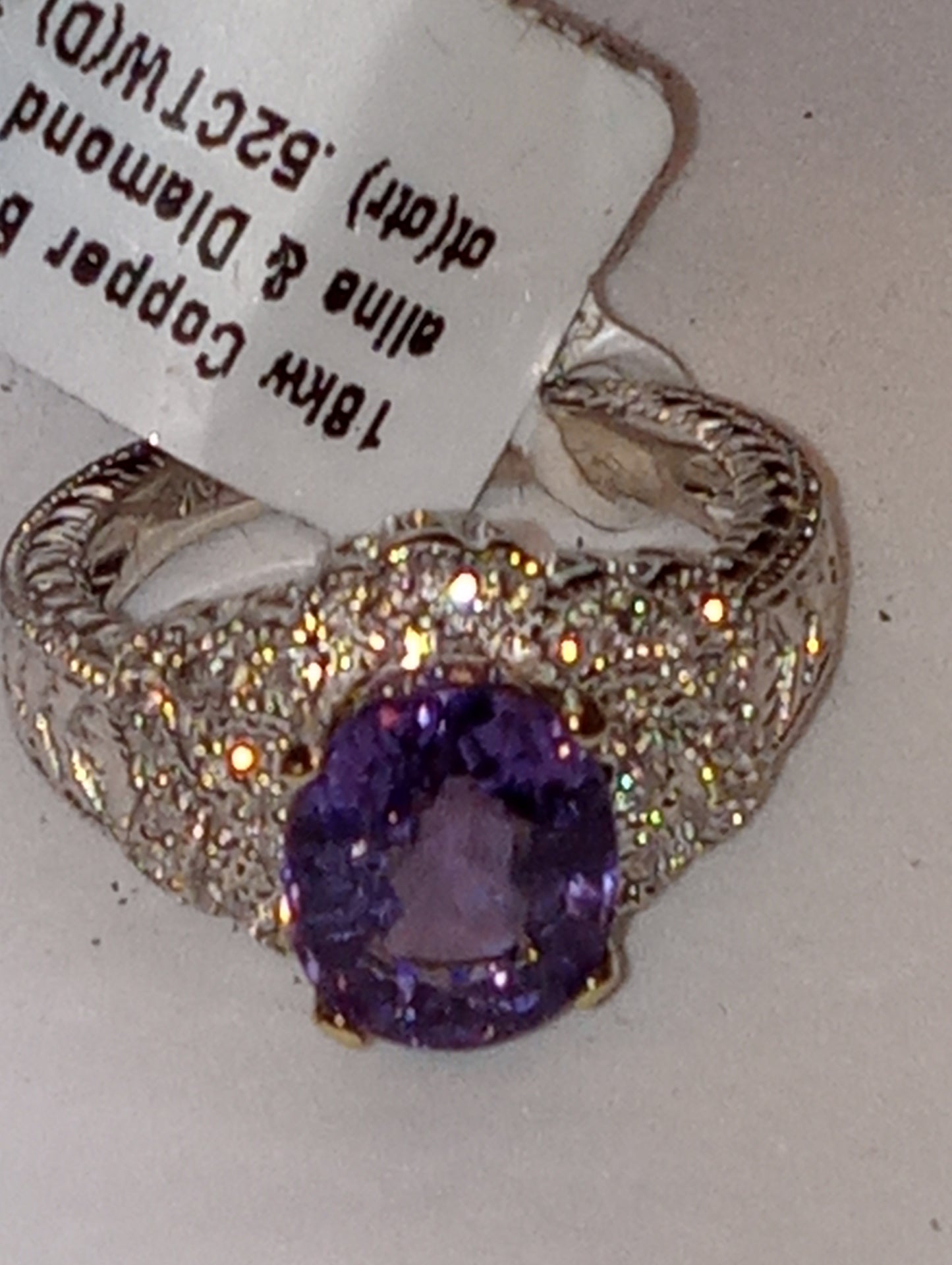 ring , purple tourmaline, 18kt