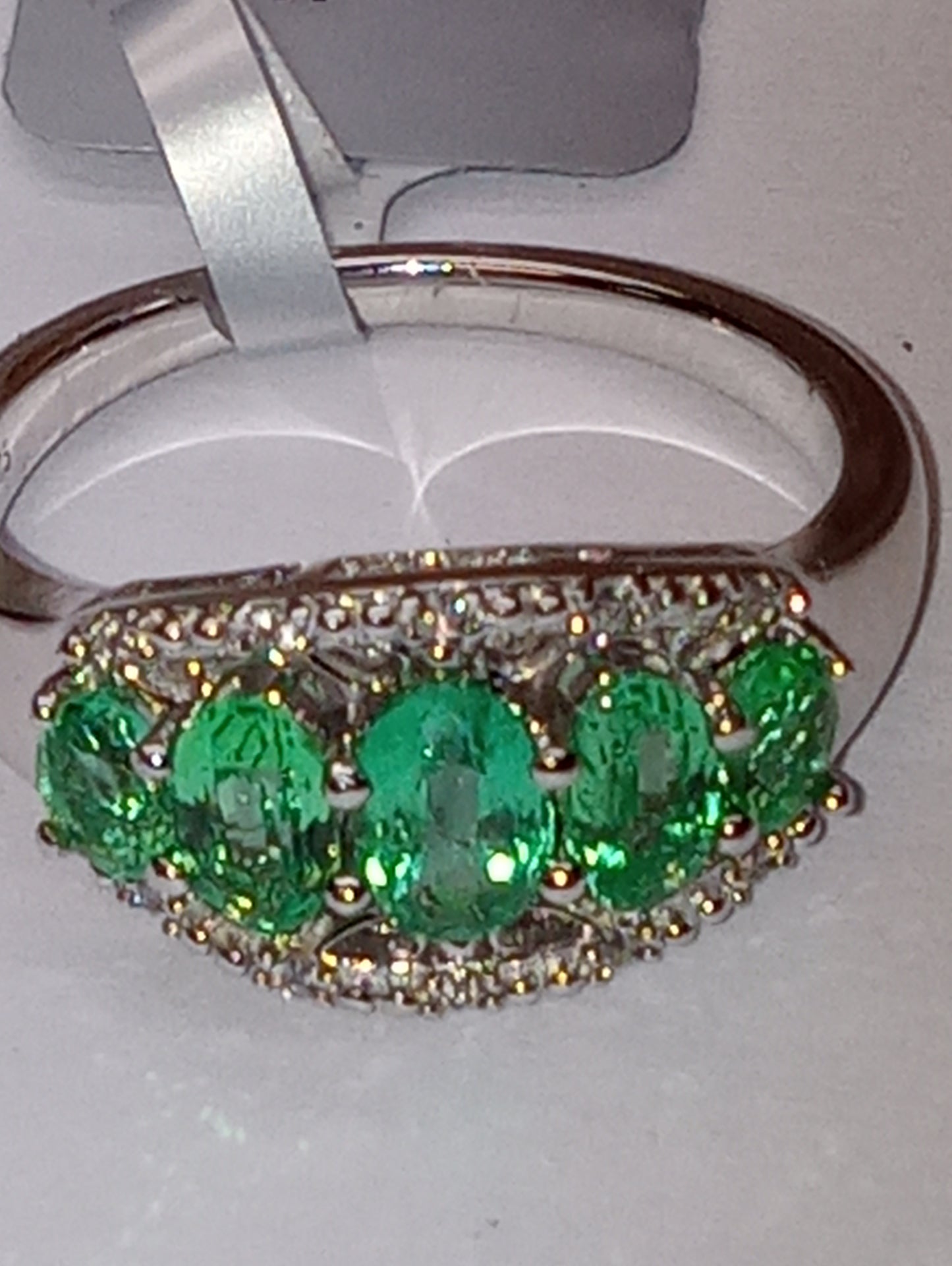 emerald ring Zambian ,whiter zircon rhodium over sterling silver size 7