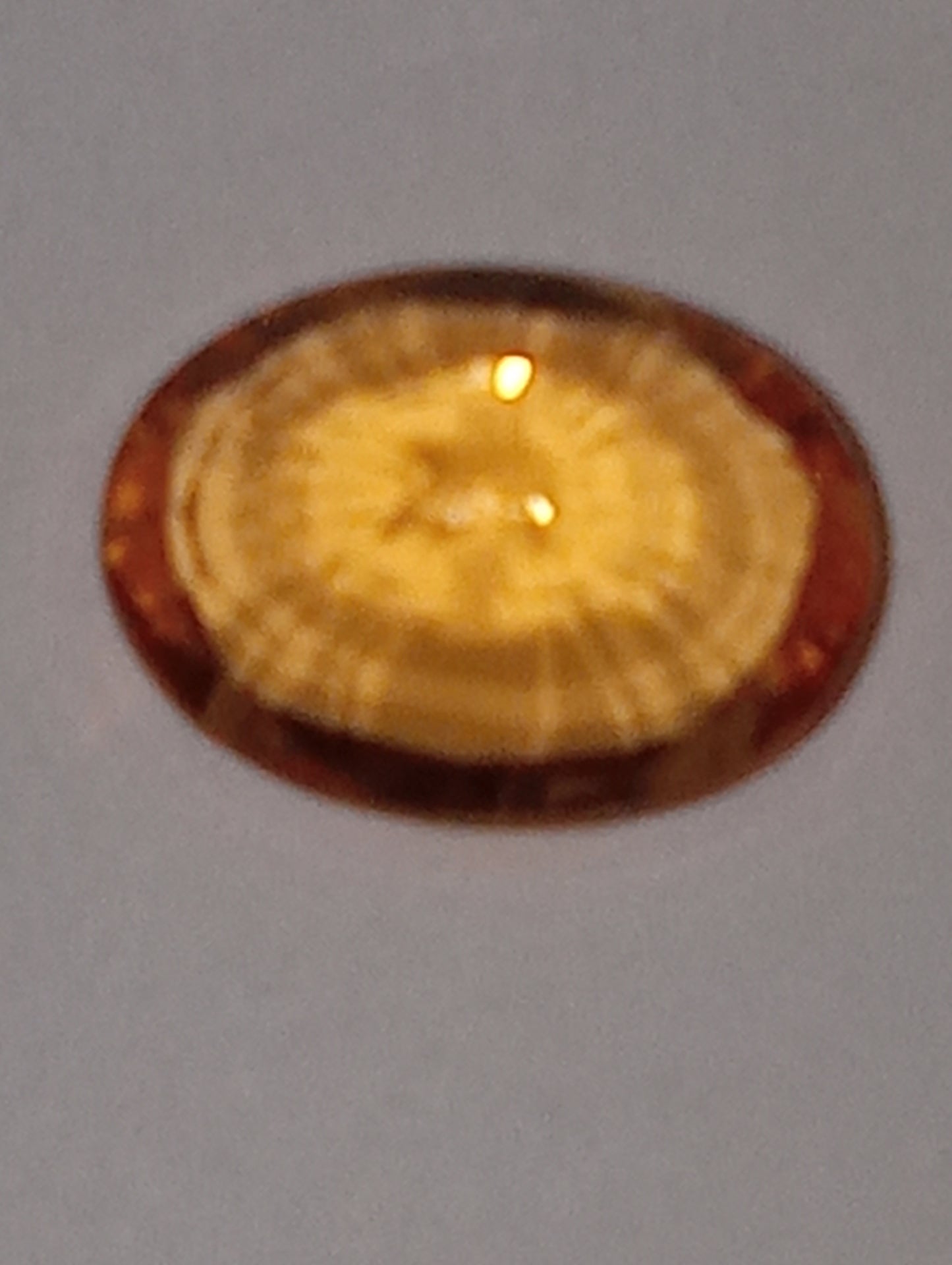 garnet gemstone  mandarin spessartite,  7mmx5mm oval, 1.12ct