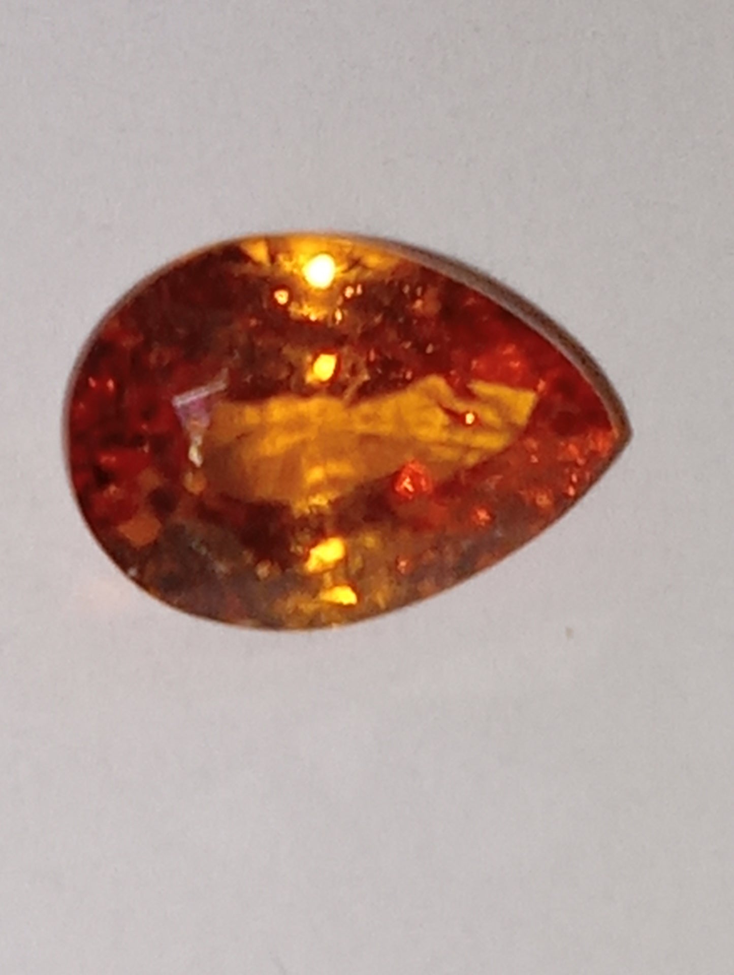 garnet gemstone, mandarin spessartite, pear cut, 1.05ct