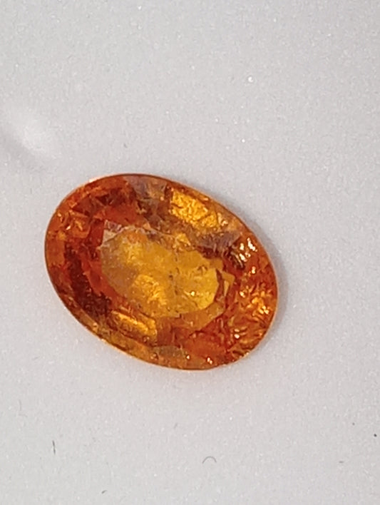 garnet gemstone mandarin spessartite, 7mmx5mm oval cut, 1.26ct