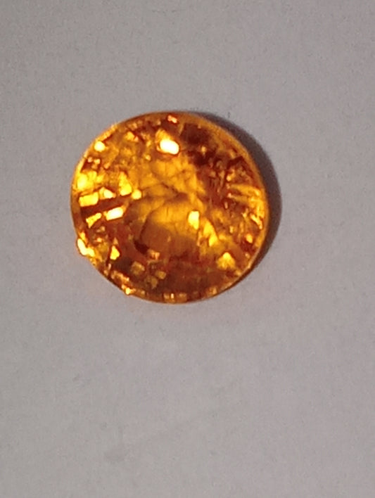 garnet gemstone mandarin spessartite 5mm round cut, .82ct