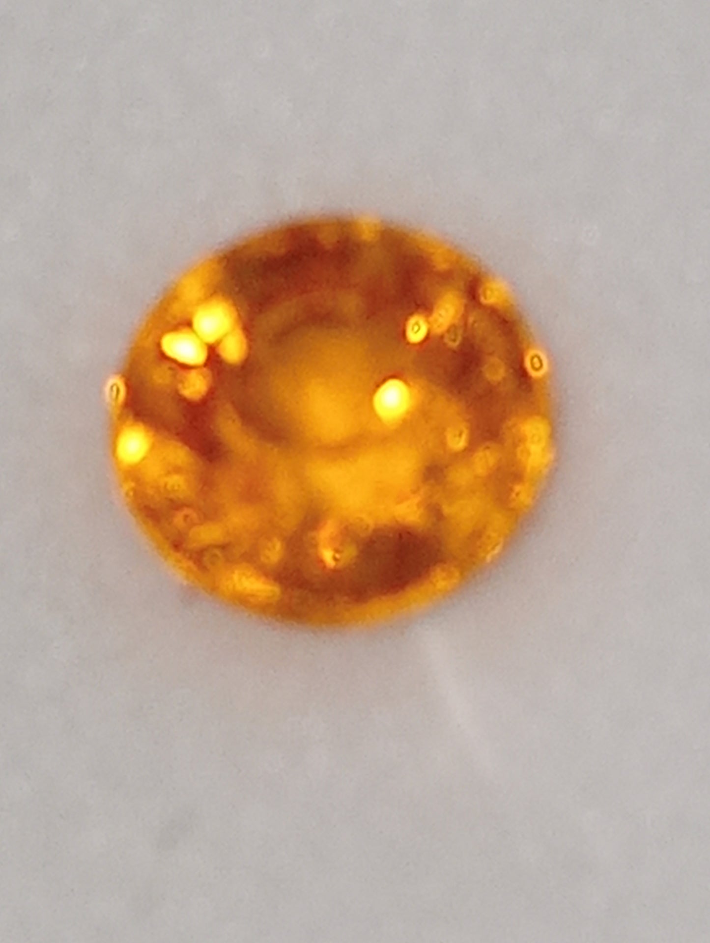 garnet gemstone mandarin spessartite, 5mm round cut, .98ct