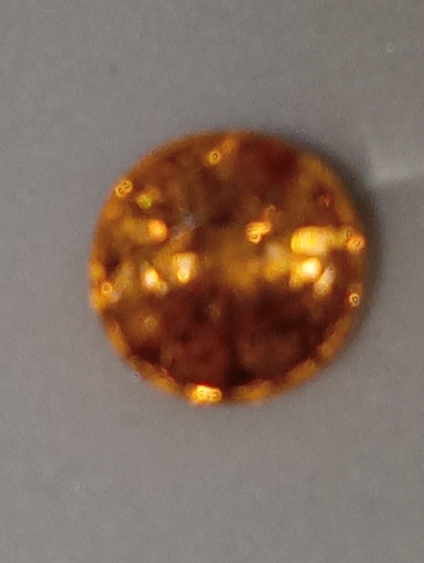 garnet gemstone mandarin spessartite, 5mm round cut, .98ct